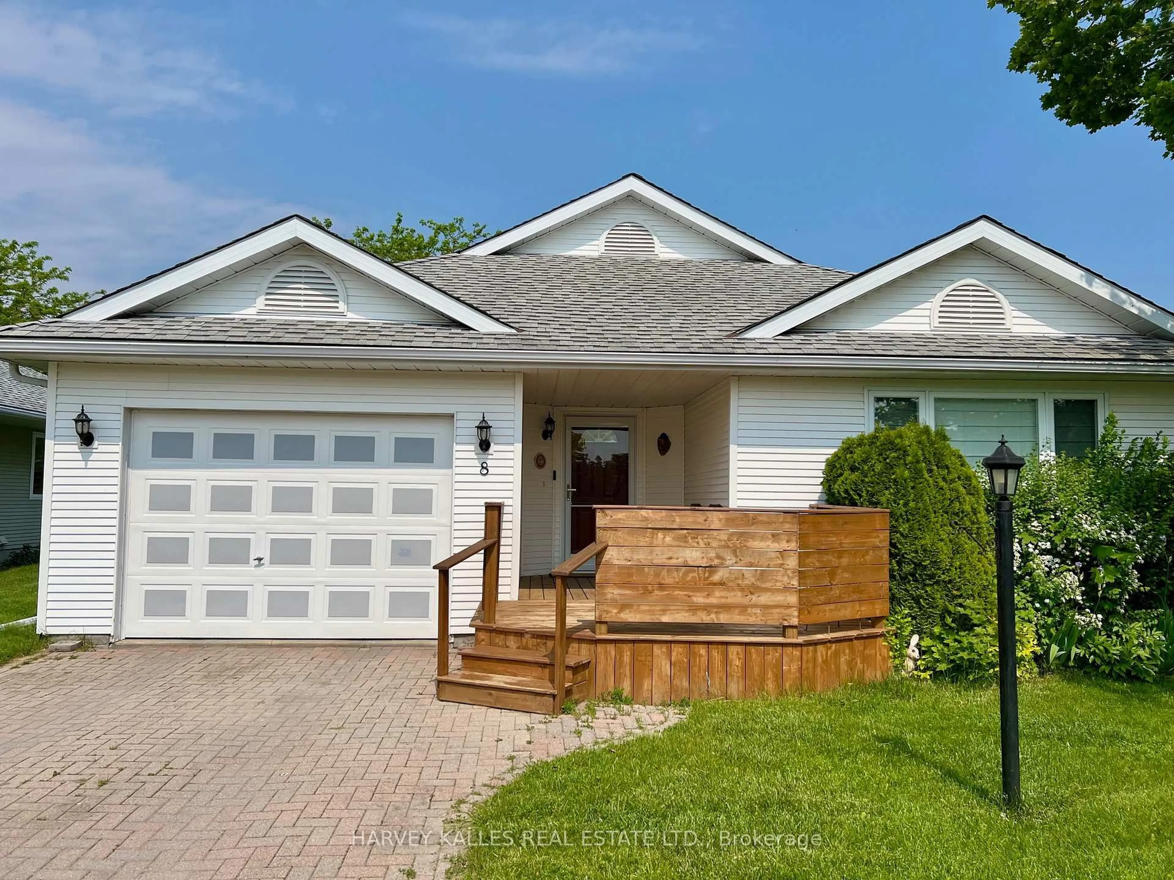 Home with vinyl exterior material, street for 8 Heritage Dr, Prince Edward County Ontario K0K 3L0