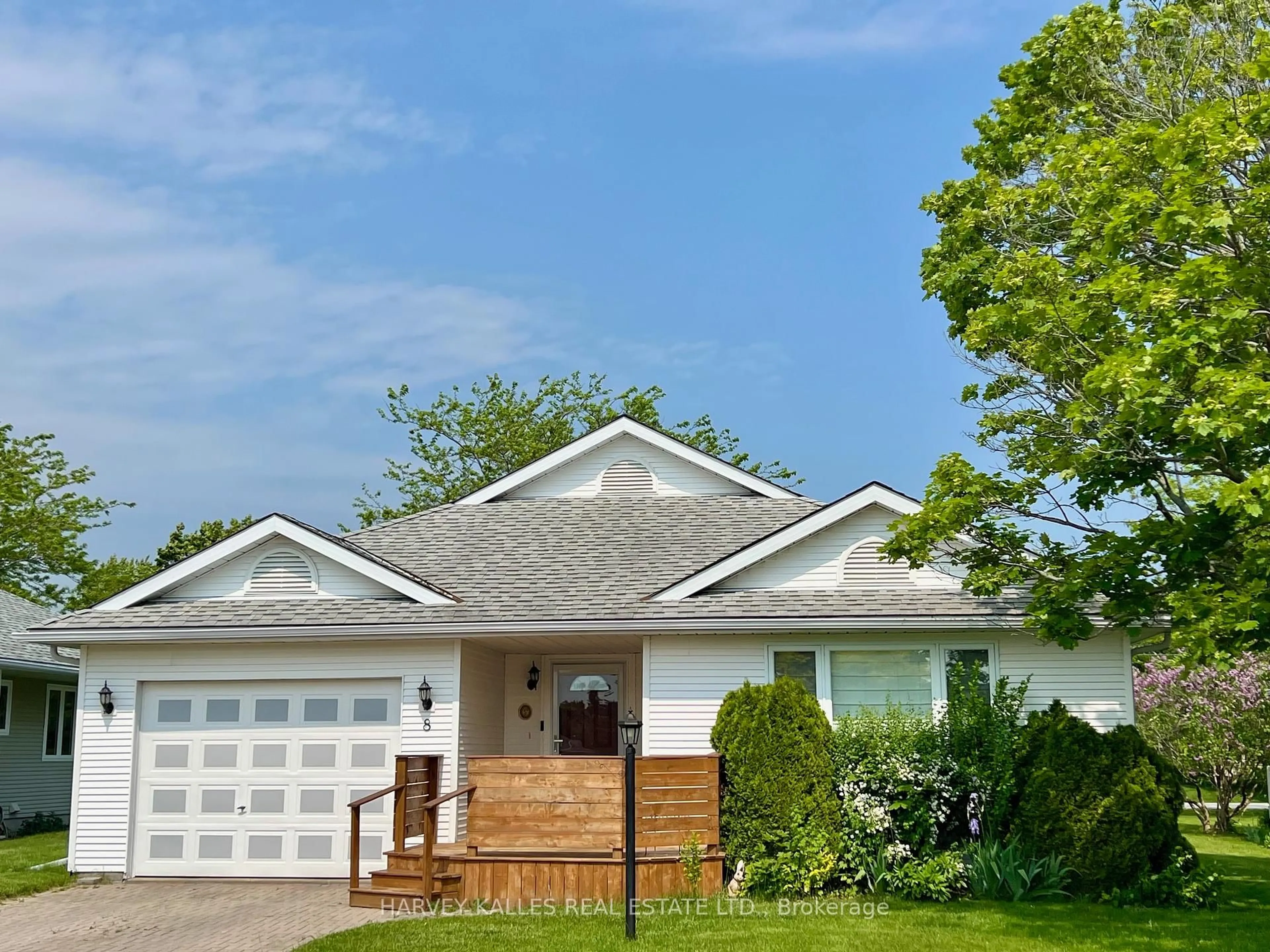 Home with vinyl exterior material, street for 8 Heritage Dr, Prince Edward County Ontario K0K 3L0