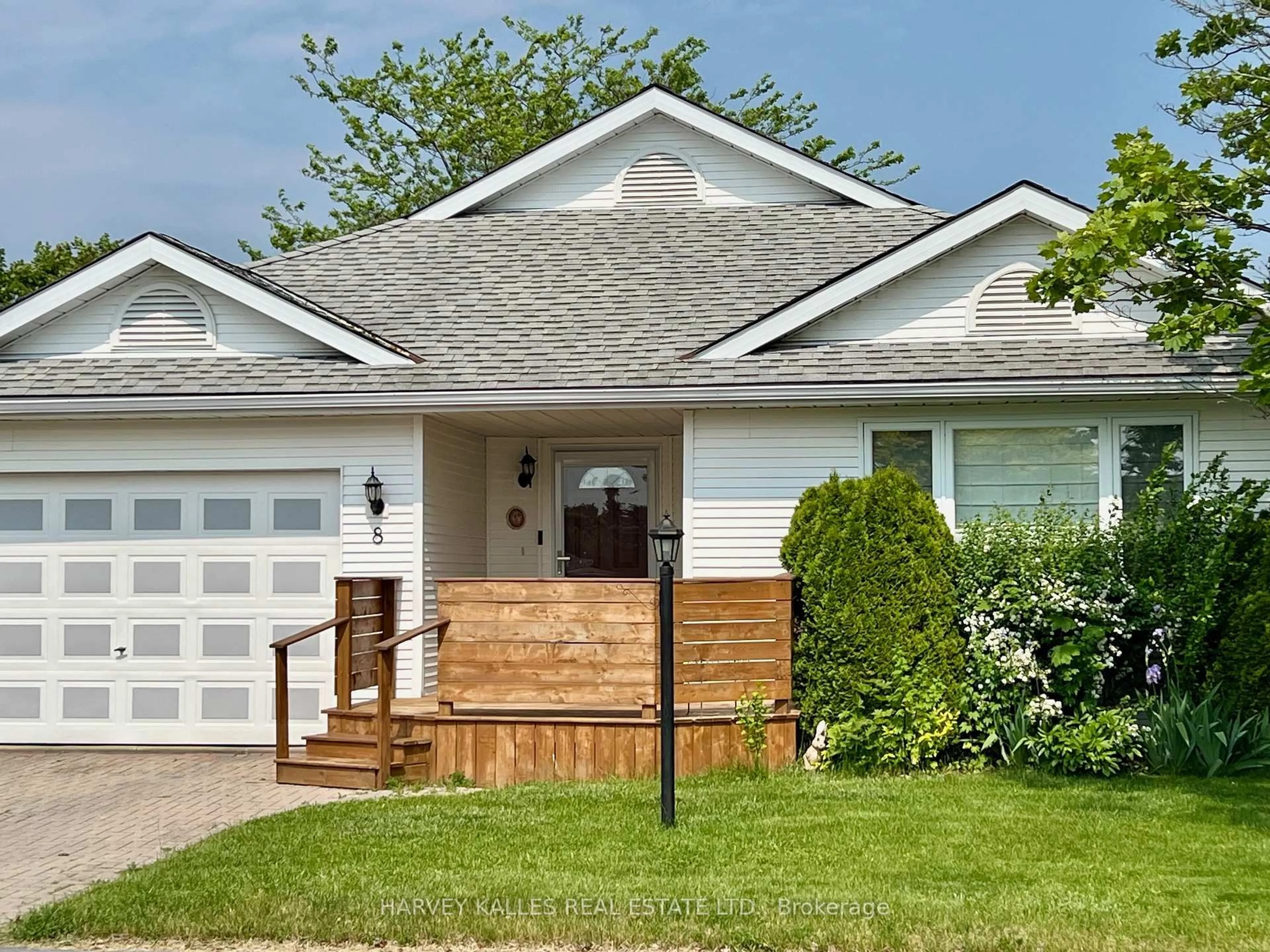 Home with vinyl exterior material, street for 8 Heritage Dr, Prince Edward County Ontario K0K 3L0