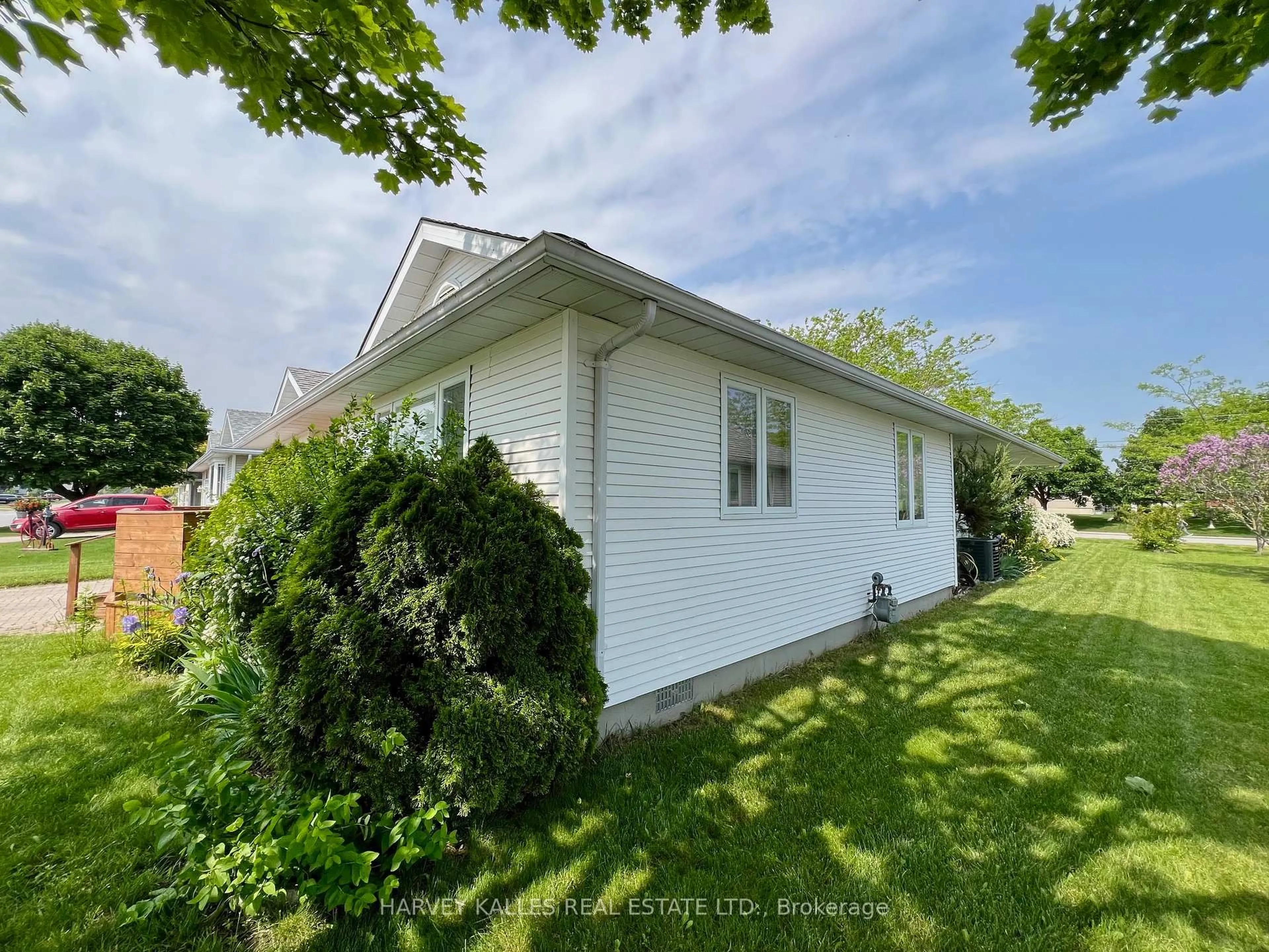 Home with vinyl exterior material, street for 8 Heritage Dr, Prince Edward County Ontario K0K 3L0
