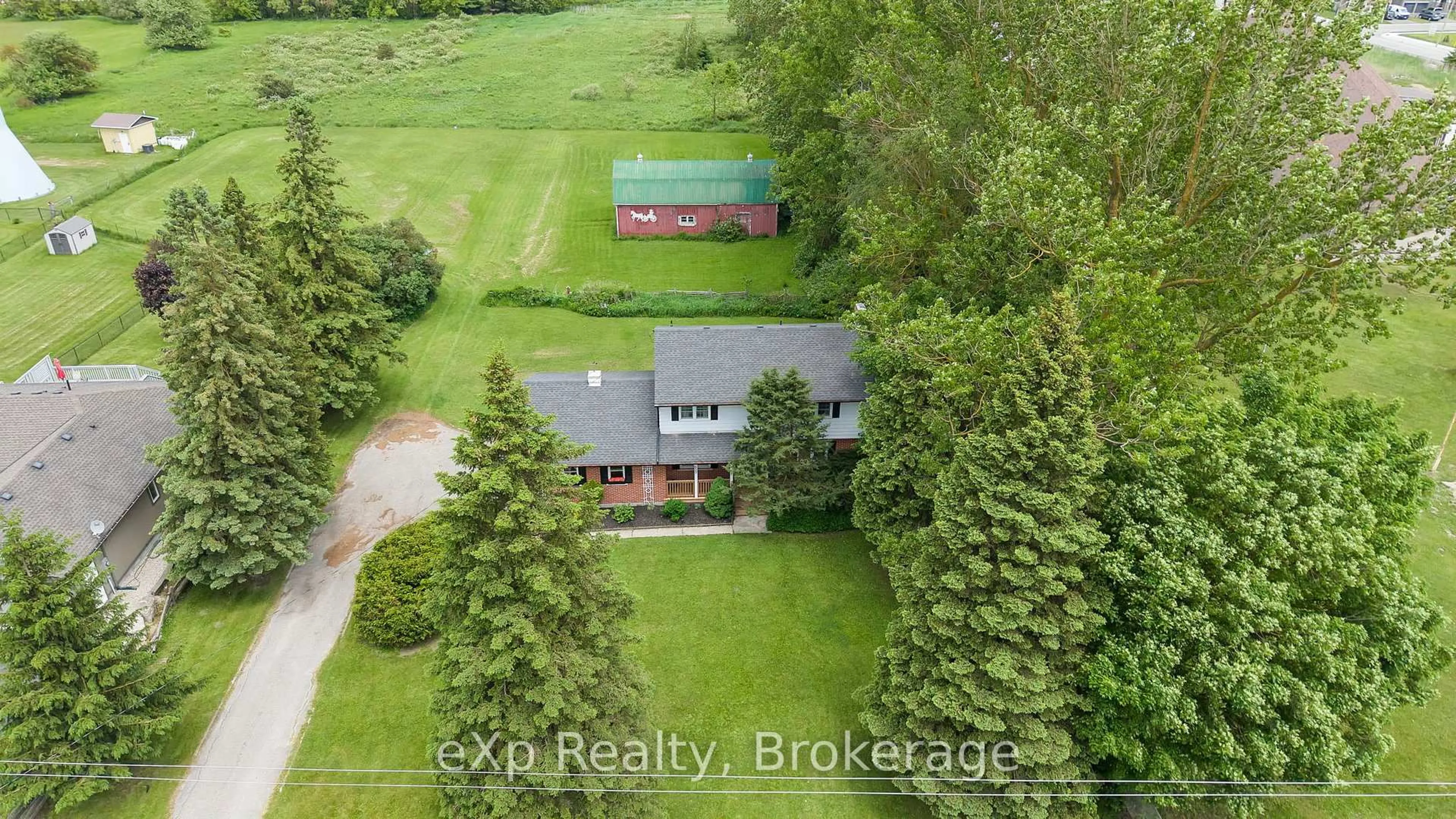 A pic from outside/outdoor area/front of a property/back of a property/a pic from drone, unknown for 450 Smith St, Wellington North Ontario N0G 1A0
