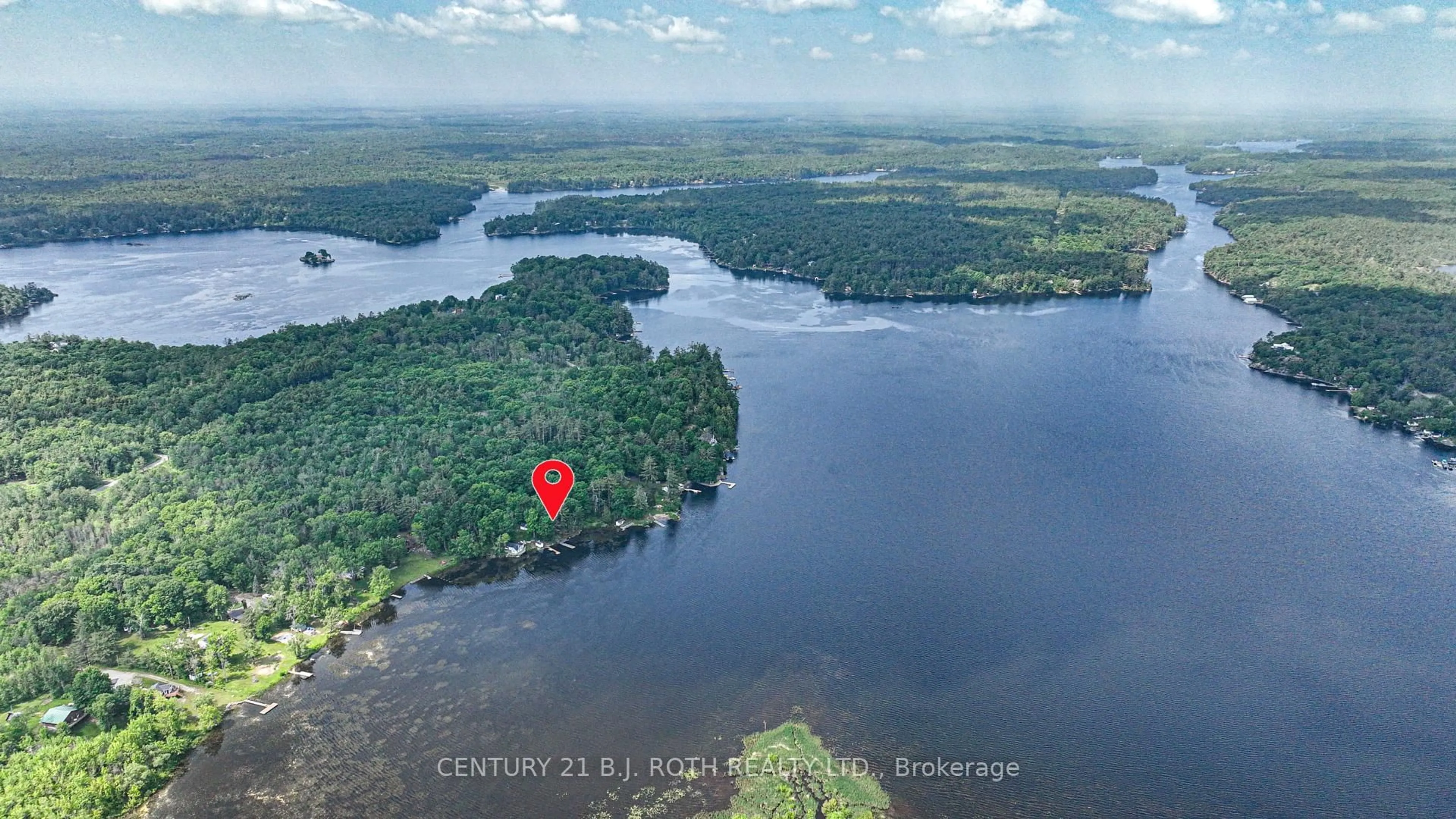 A pic from outside/outdoor area/front of a property/back of a property/a pic from drone, water/lake/river/ocean view for 1007 1100 Rd, Gravenhurst Ontario P0E 1G0