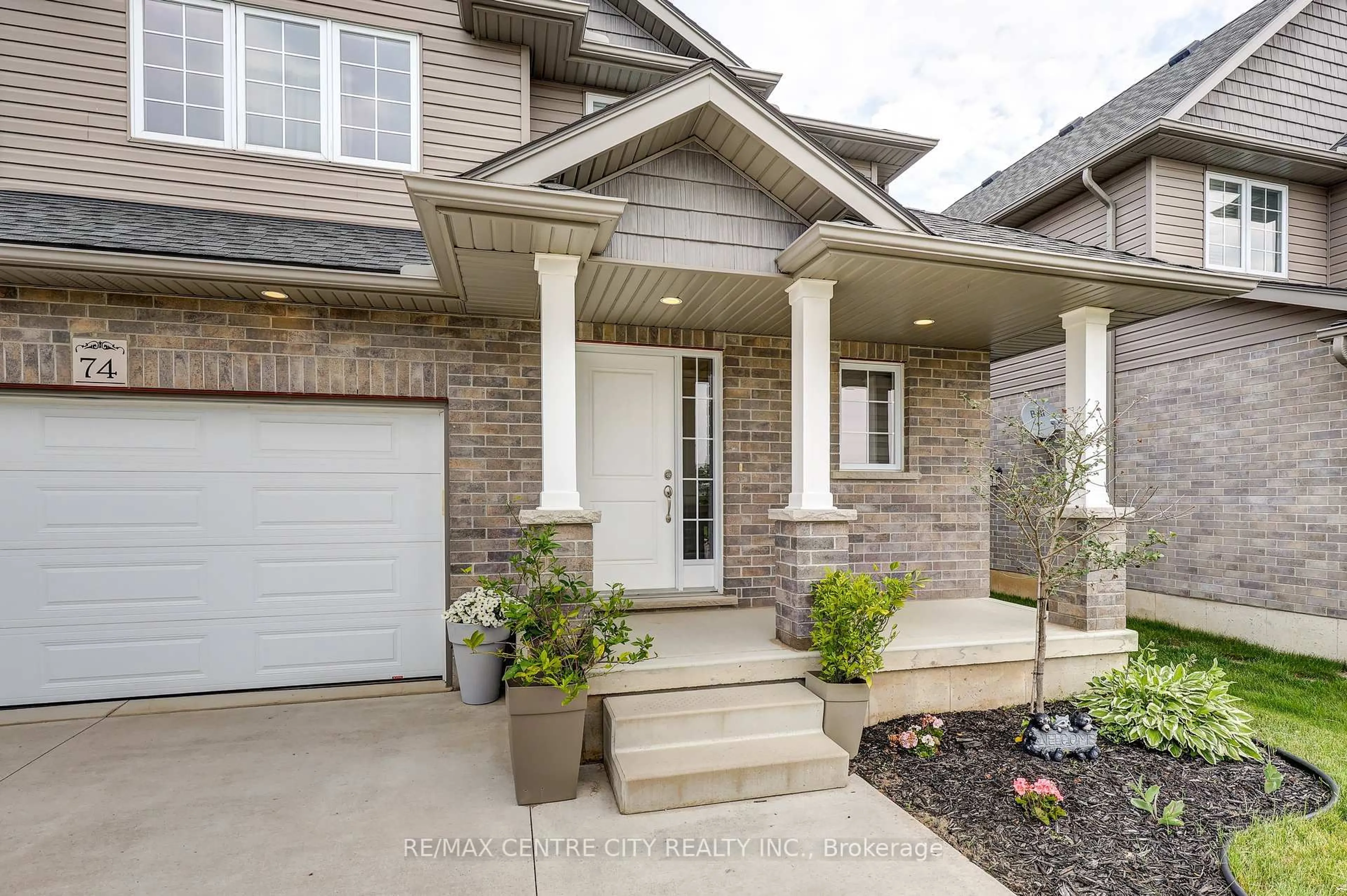Home with brick exterior material, street for 74 Pearl St, Tillsonburg Ontario N4G 0A3