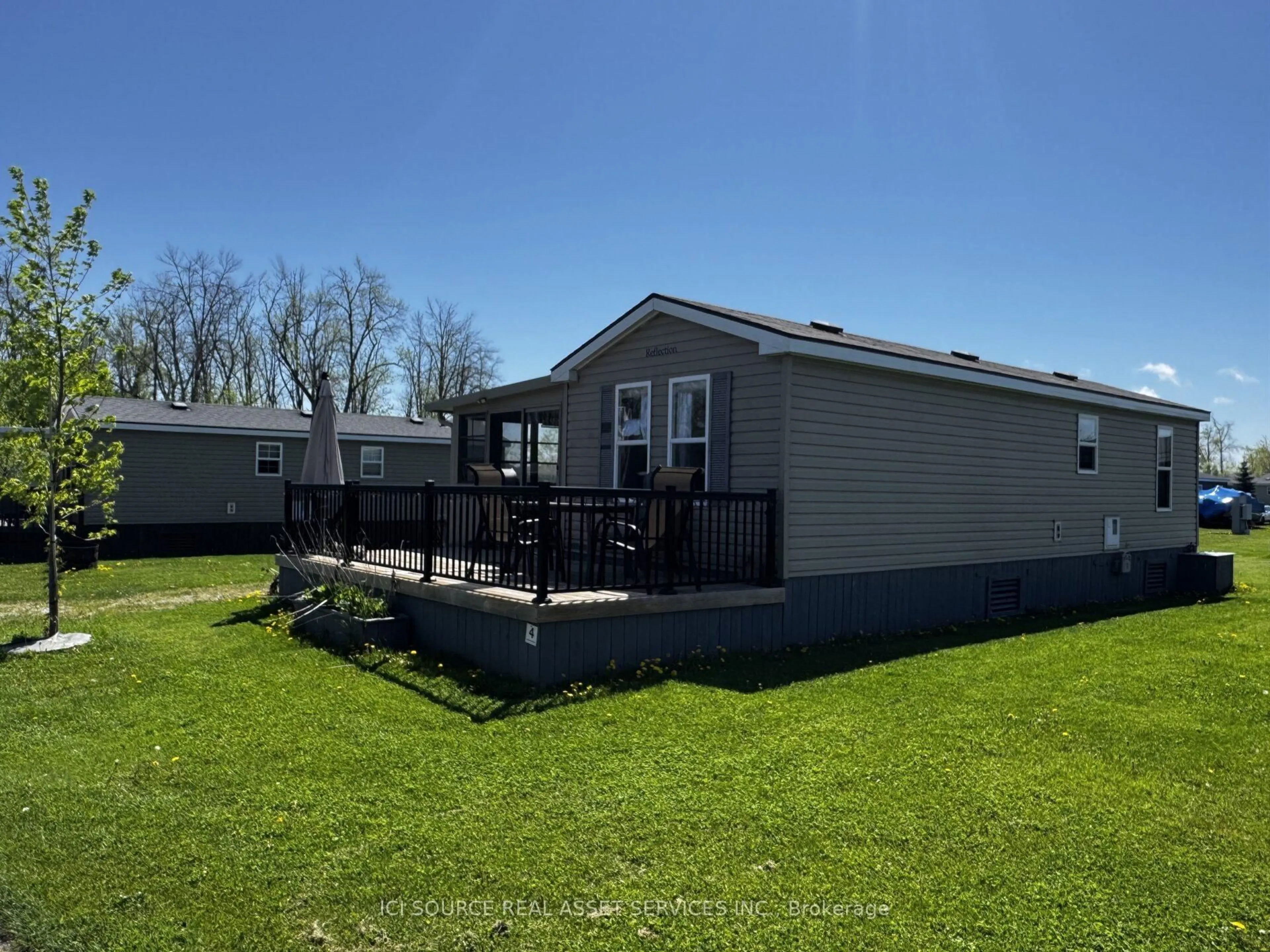 A pic from outside/outdoor area/front of a property/back of a property/a pic from drone, water/lake/river/ocean view for 1235 Villiers Line #LSC004, Otonabee-South Monaghan Ontario K0L 2G0