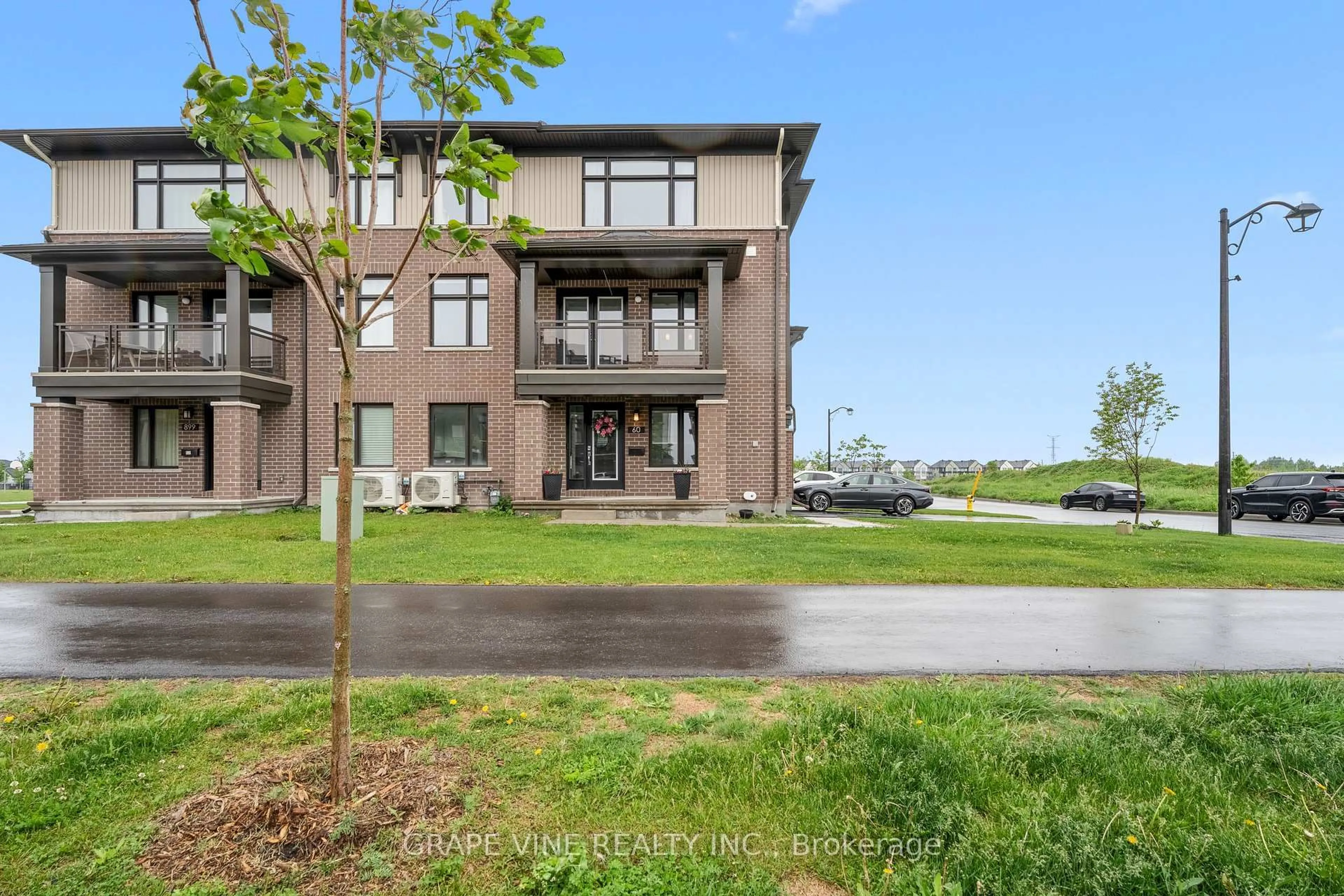 A pic from outside/outdoor area/front of a property/back of a property/a pic from drone, water/lake/river/ocean view for 60 Verglas Lane, Ottawa Ontario K1W 0R2