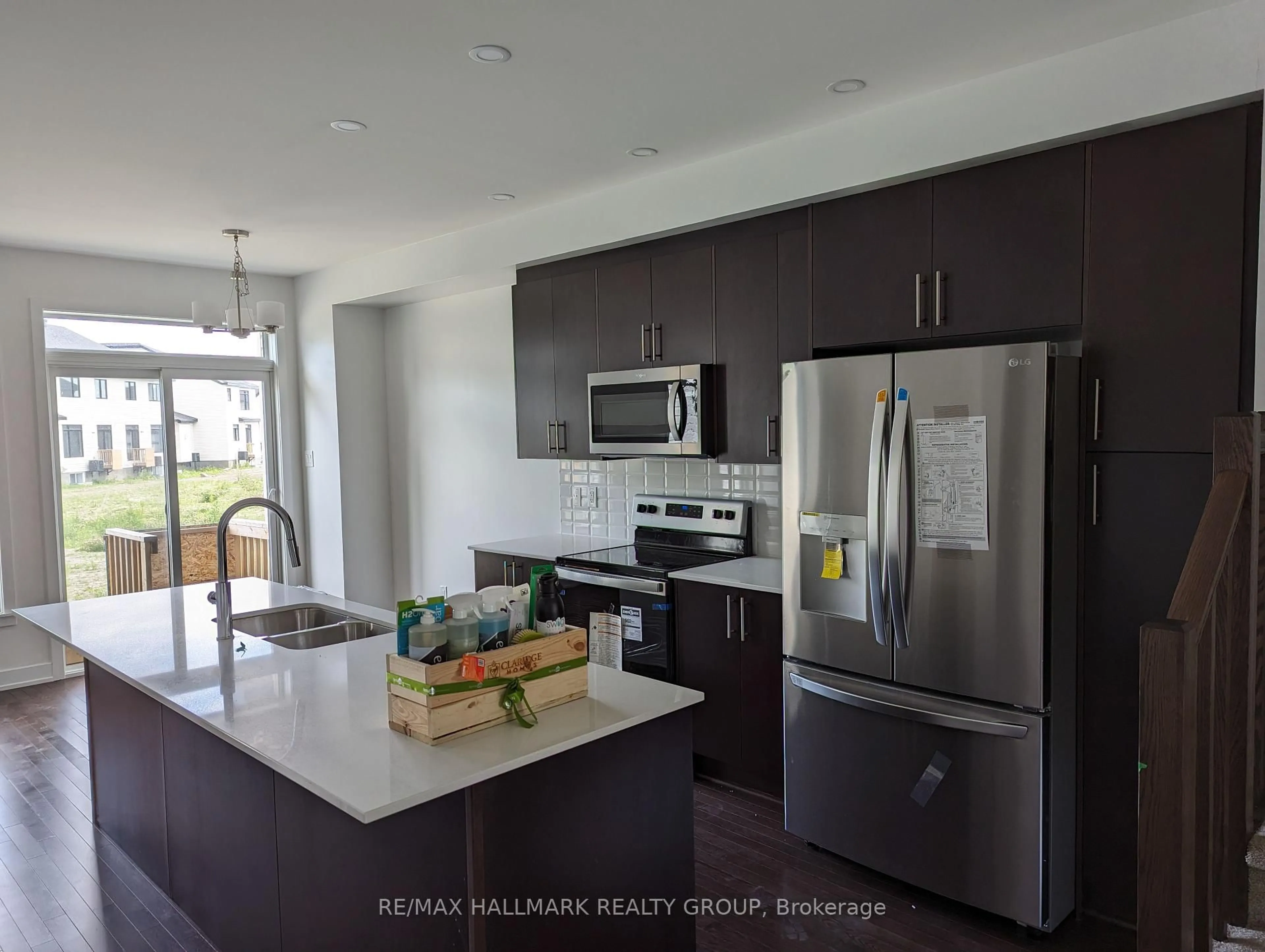 Open concept kitchen, ceramic/tile floor for 262 Darjeeling Ave, Ottawa Ontario K2J 6Z1