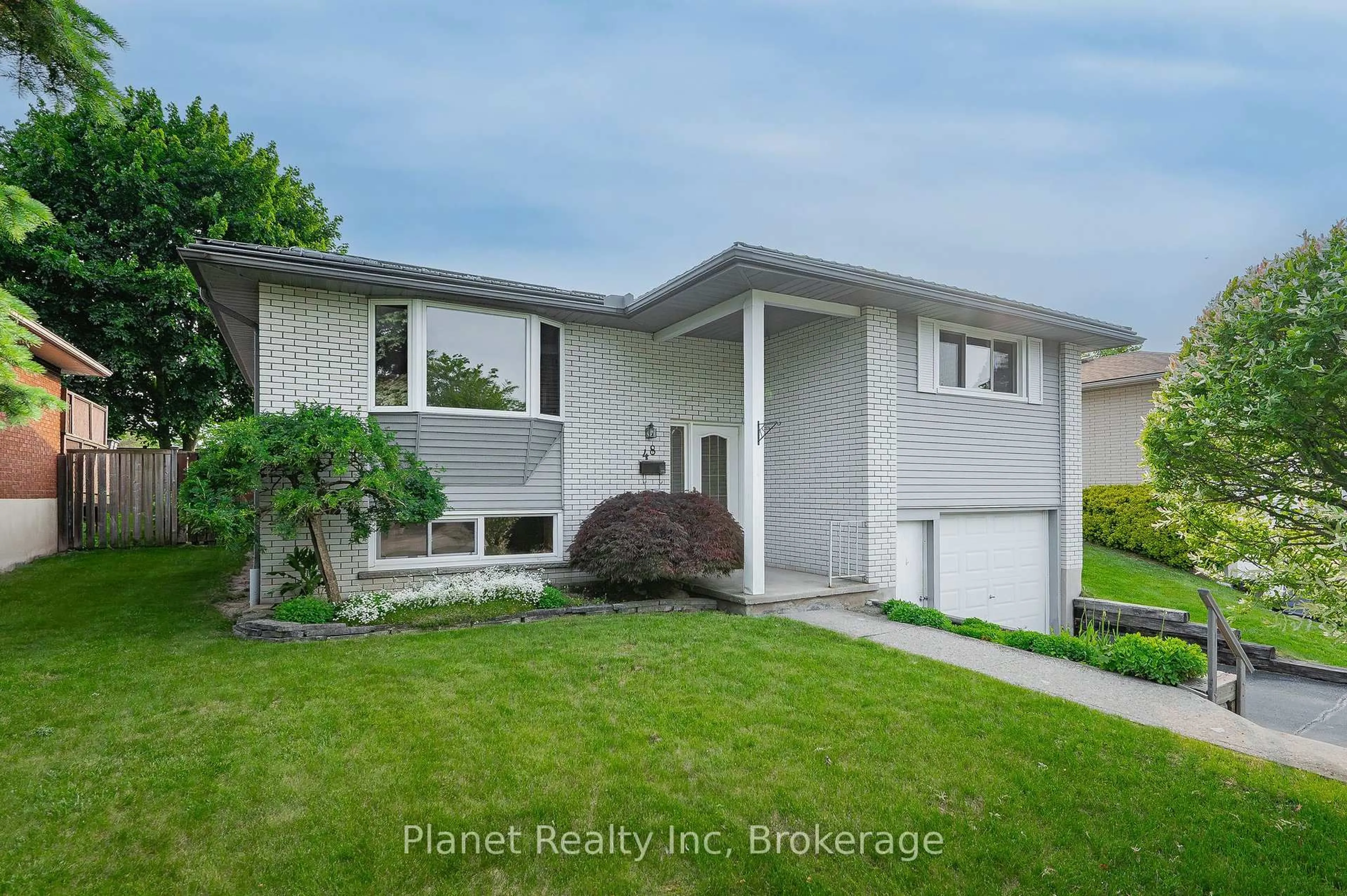 Home with vinyl exterior material, street for 48 Uplands Pl, Guelph Ontario N1E 3R4