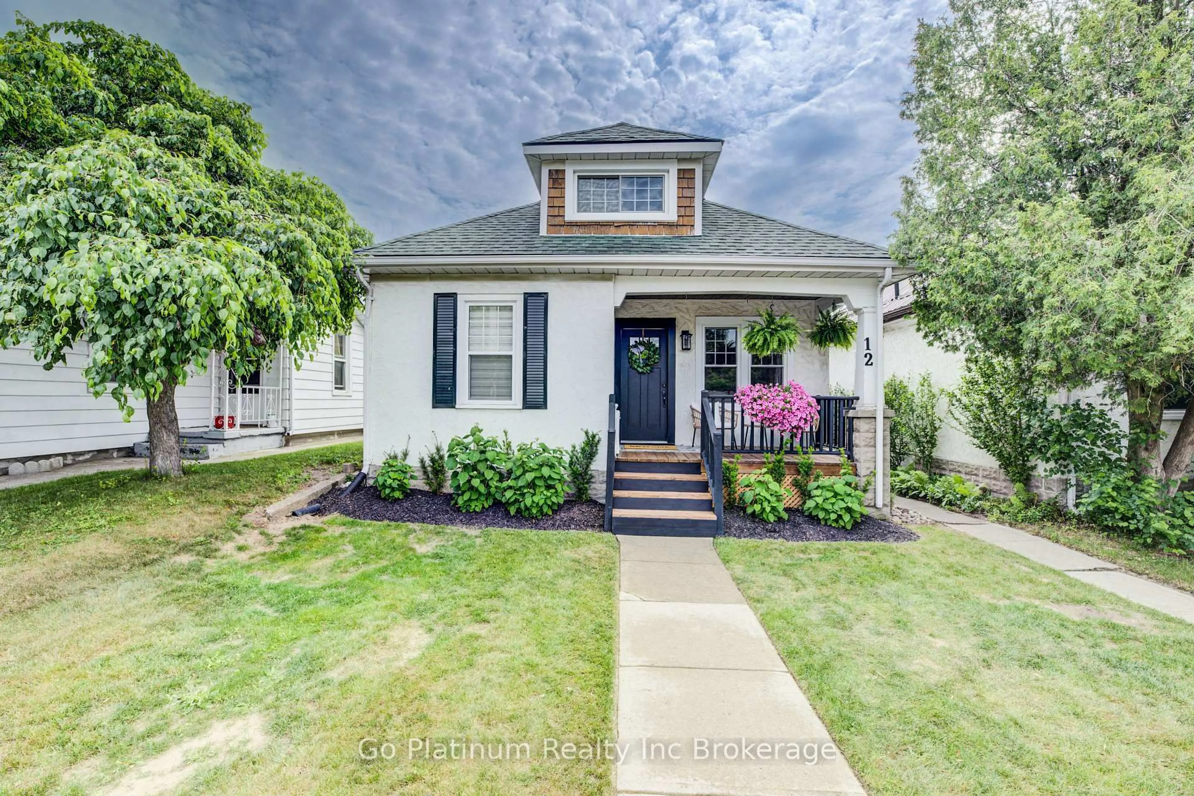 Home with brick exterior material, street for 12 King St, Tillsonburg Ontario N4G 3E2
