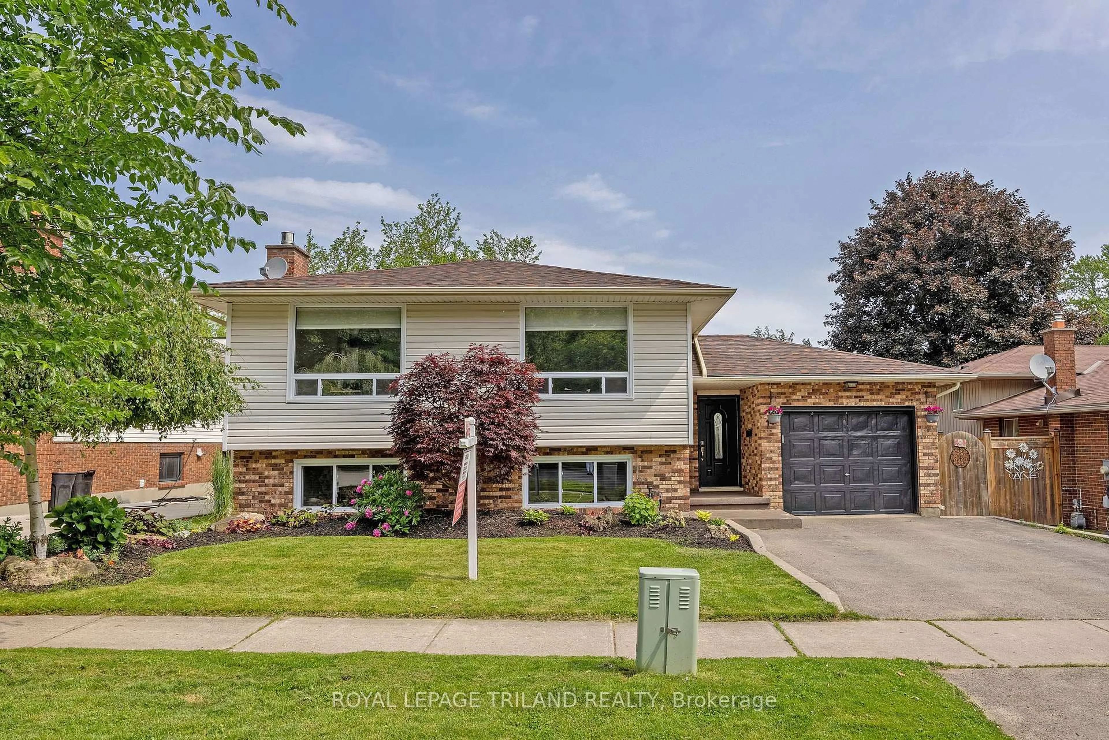 Home with brick exterior material, street for 14 Fairlane Rd, London South Ontario N6K 3E4