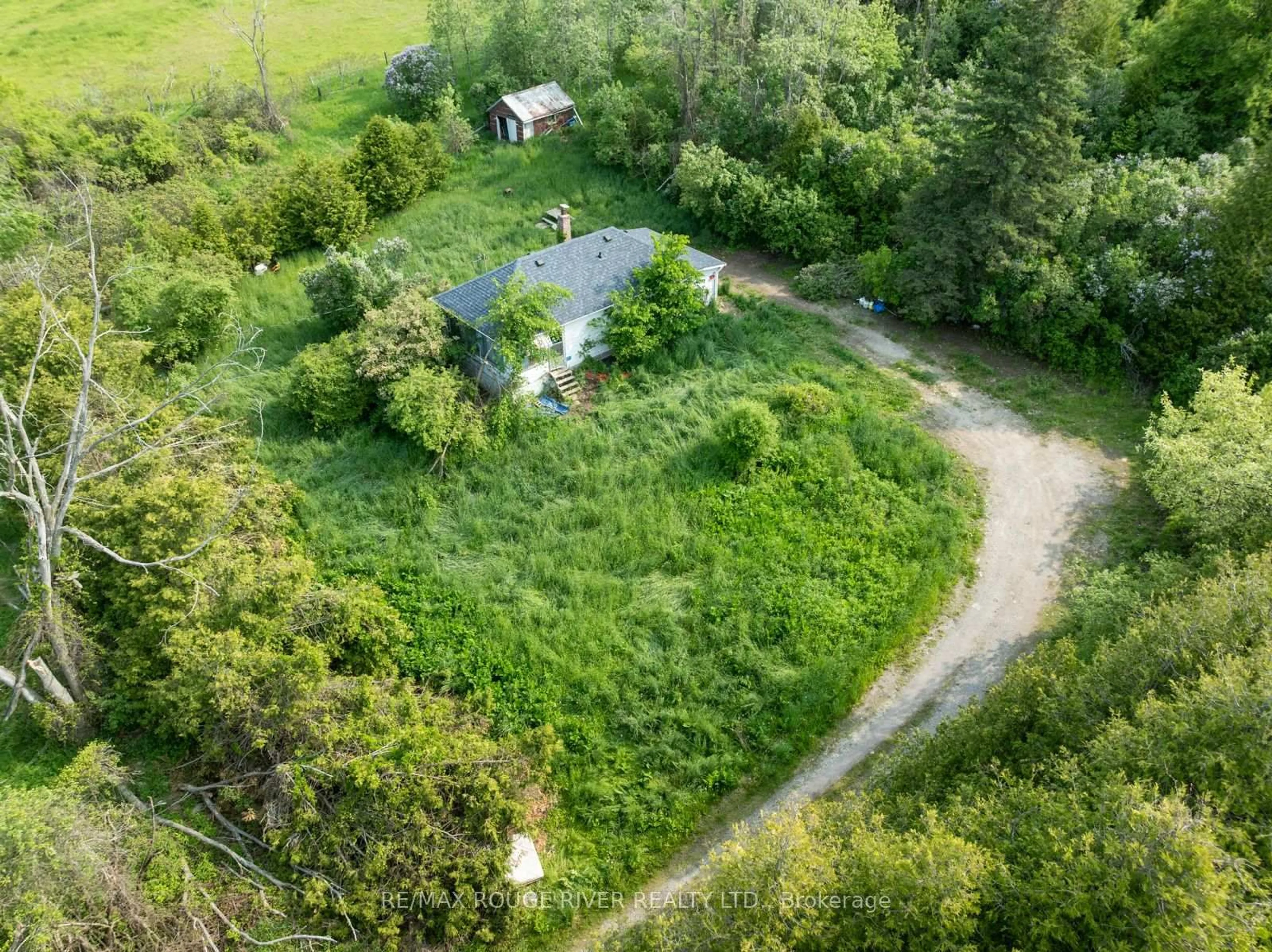 A pic from outside/outdoor area/front of a property/back of a property/a pic from drone, unknown for 15 Capstick Rd, Kawartha Lakes Ontario L0A 1A0