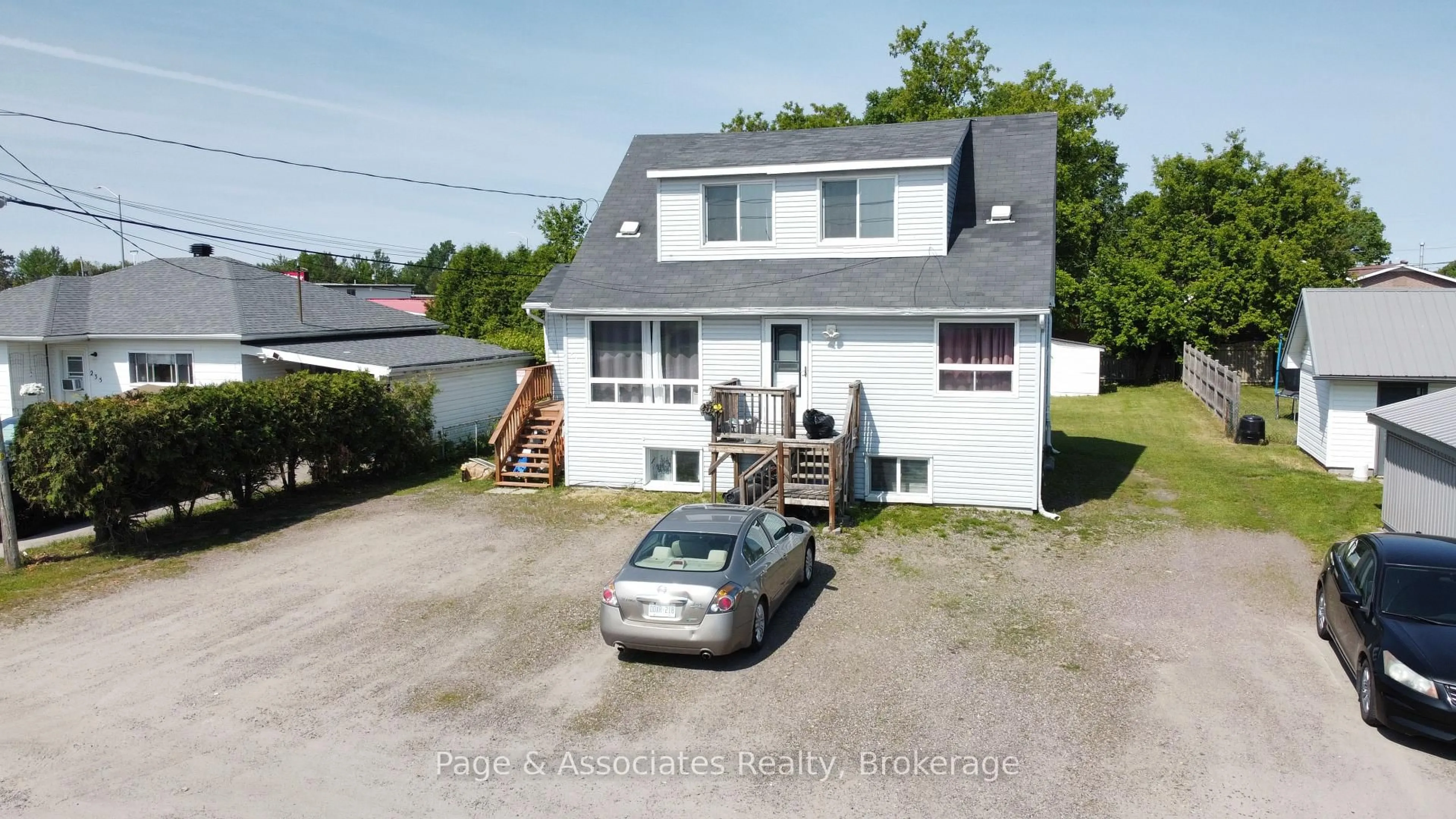 A pic from outside/outdoor area/front of a property/back of a property/a pic from drone, street for 231 Clark St, West Nipissing Ontario P2B 1A6