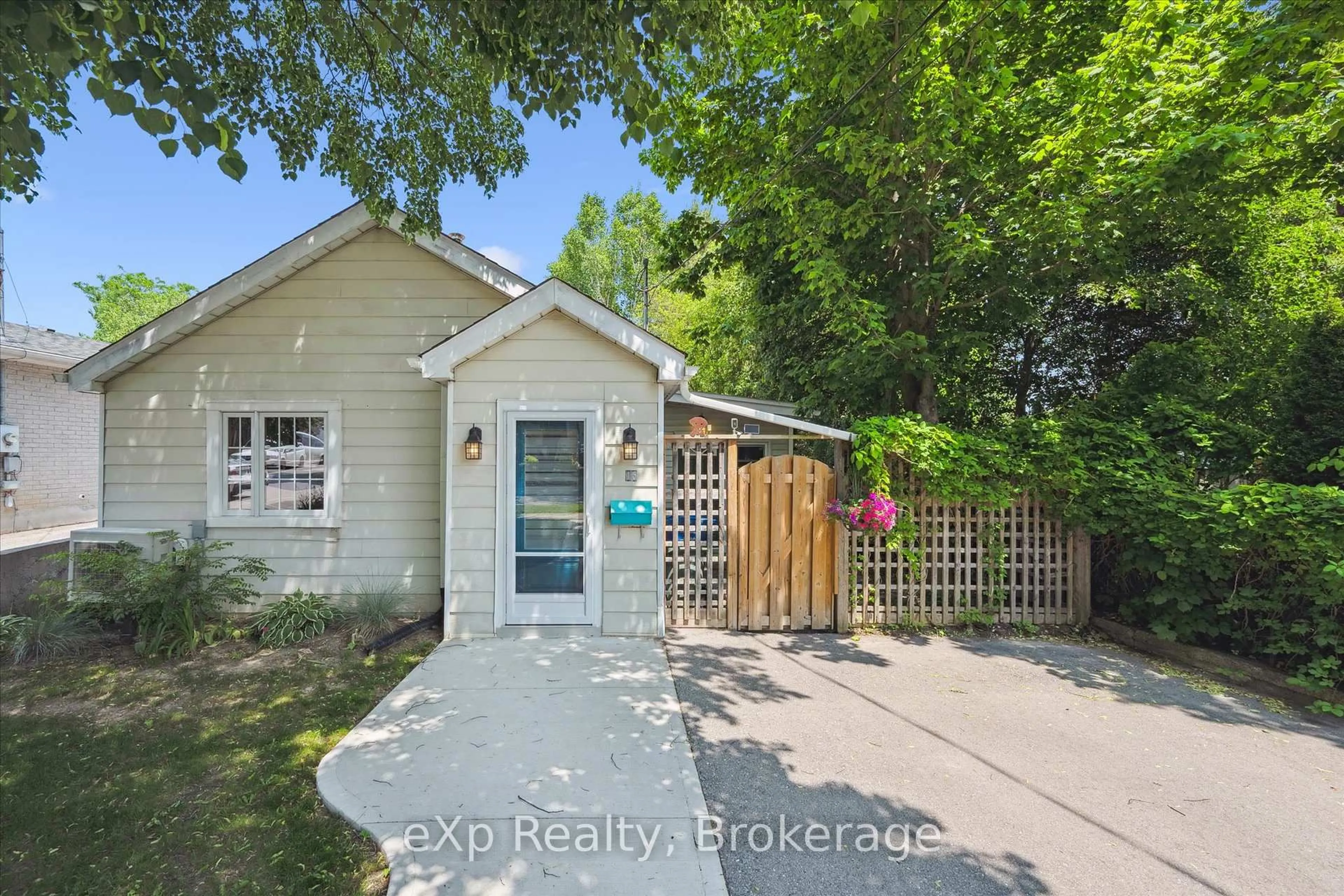 A pic from outside/outdoor area/front of a property/back of a property/a pic from drone, street for 15 Laurine Ave, Guelph Ontario N1E 4N1