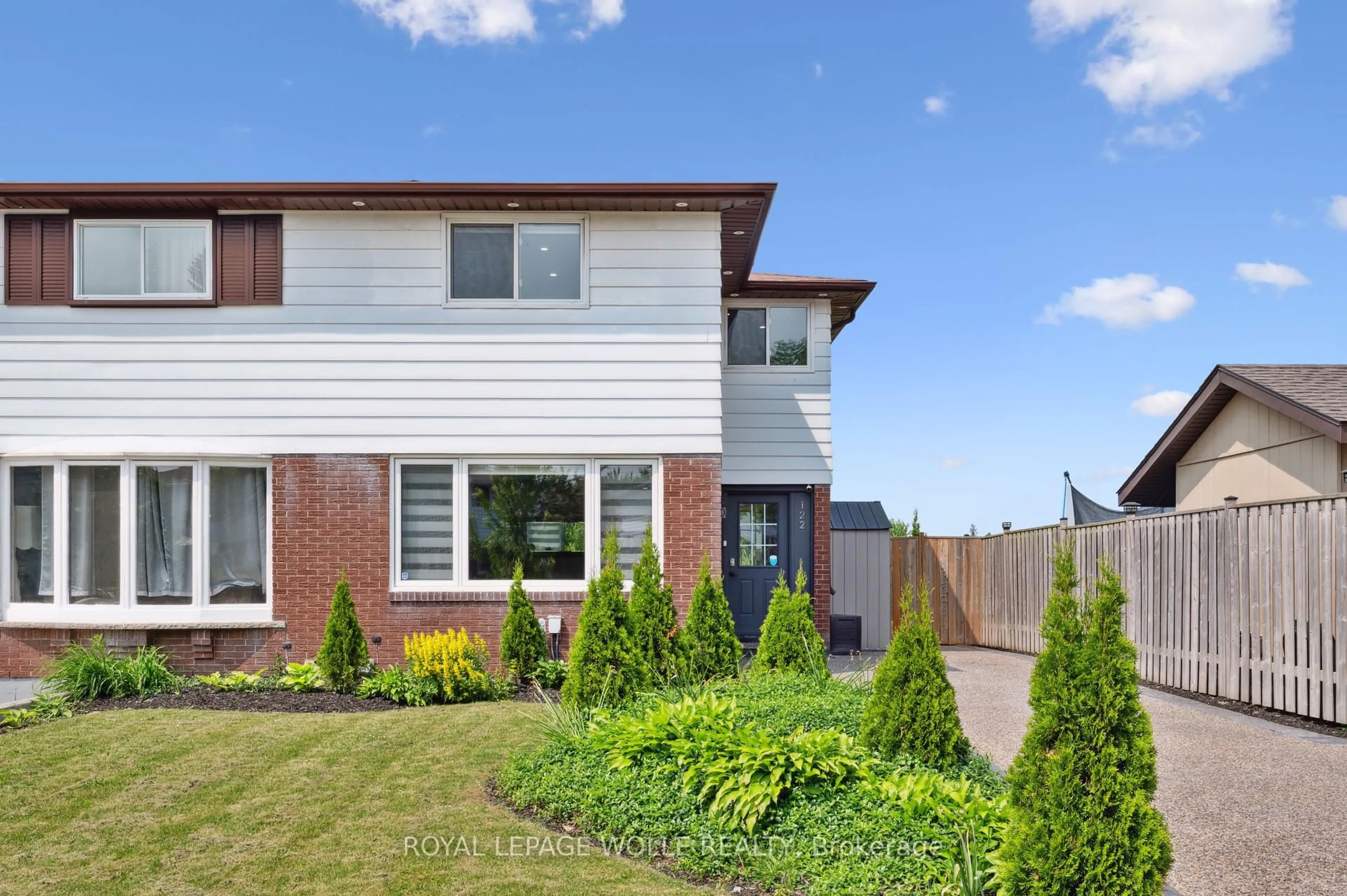 Home with brick exterior material, street for 122 Mooregate Cres, Kitchener Ontario N2M 2G1