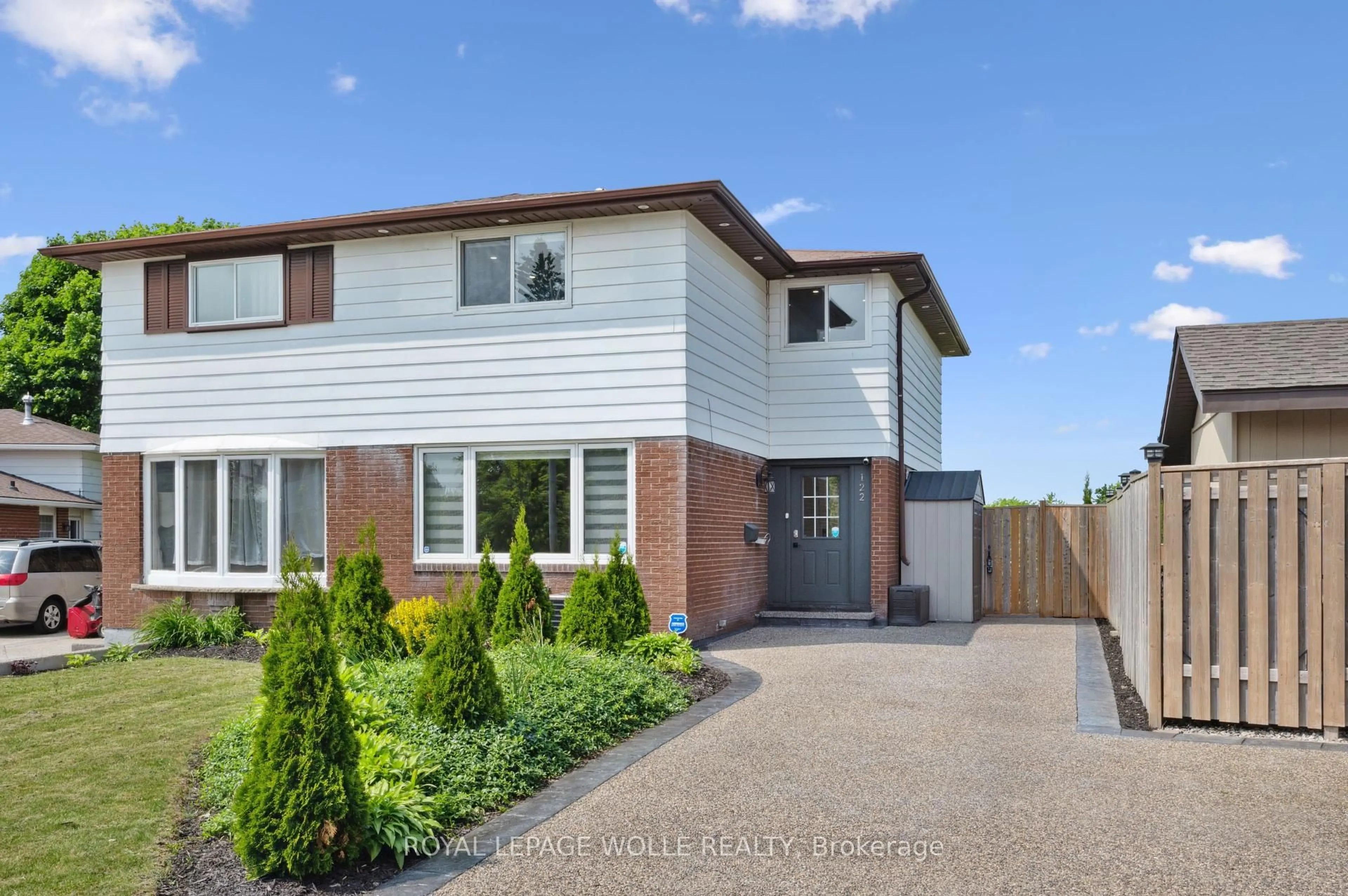 Home with brick exterior material, street for 122 Mooregate Cres, Kitchener Ontario N2M 2G1