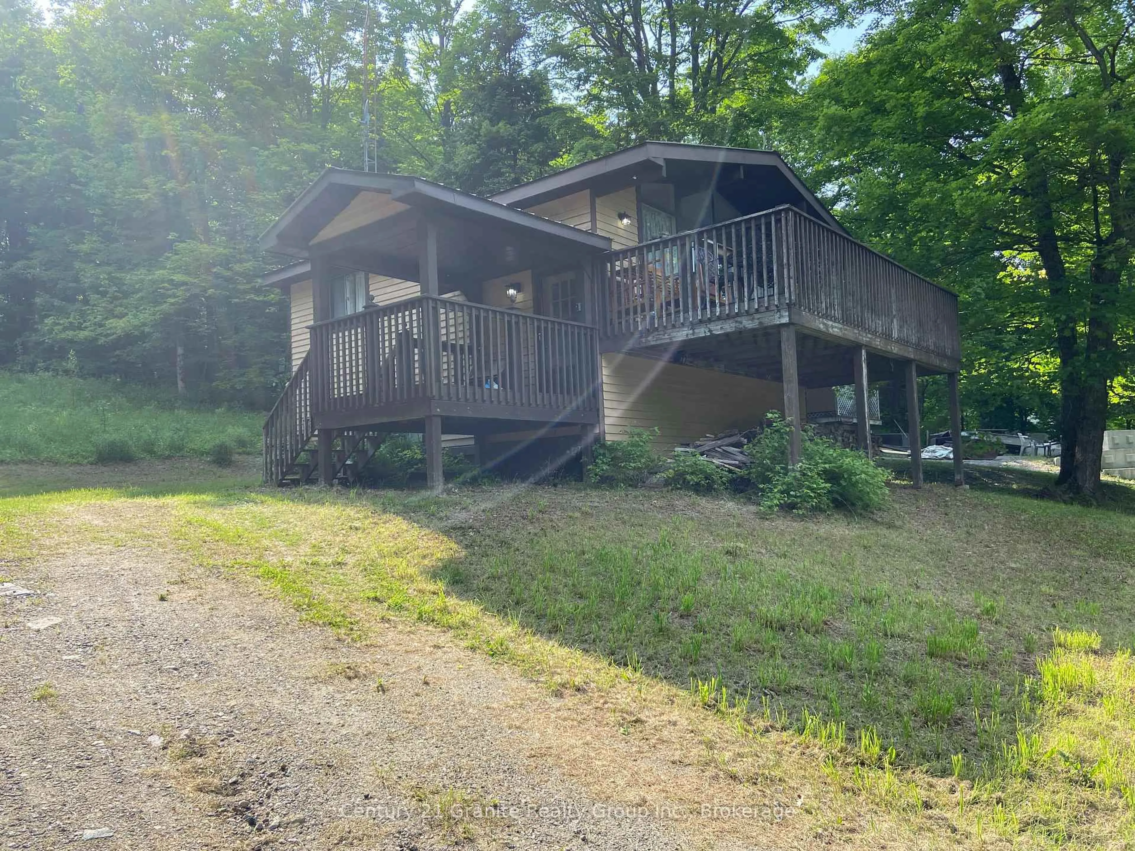 A pic from outside/outdoor area/front of a property/back of a property/a pic from drone, unknown for 1549 Trappers Trail Rd, Dysart et al Ontario K0M 1S0