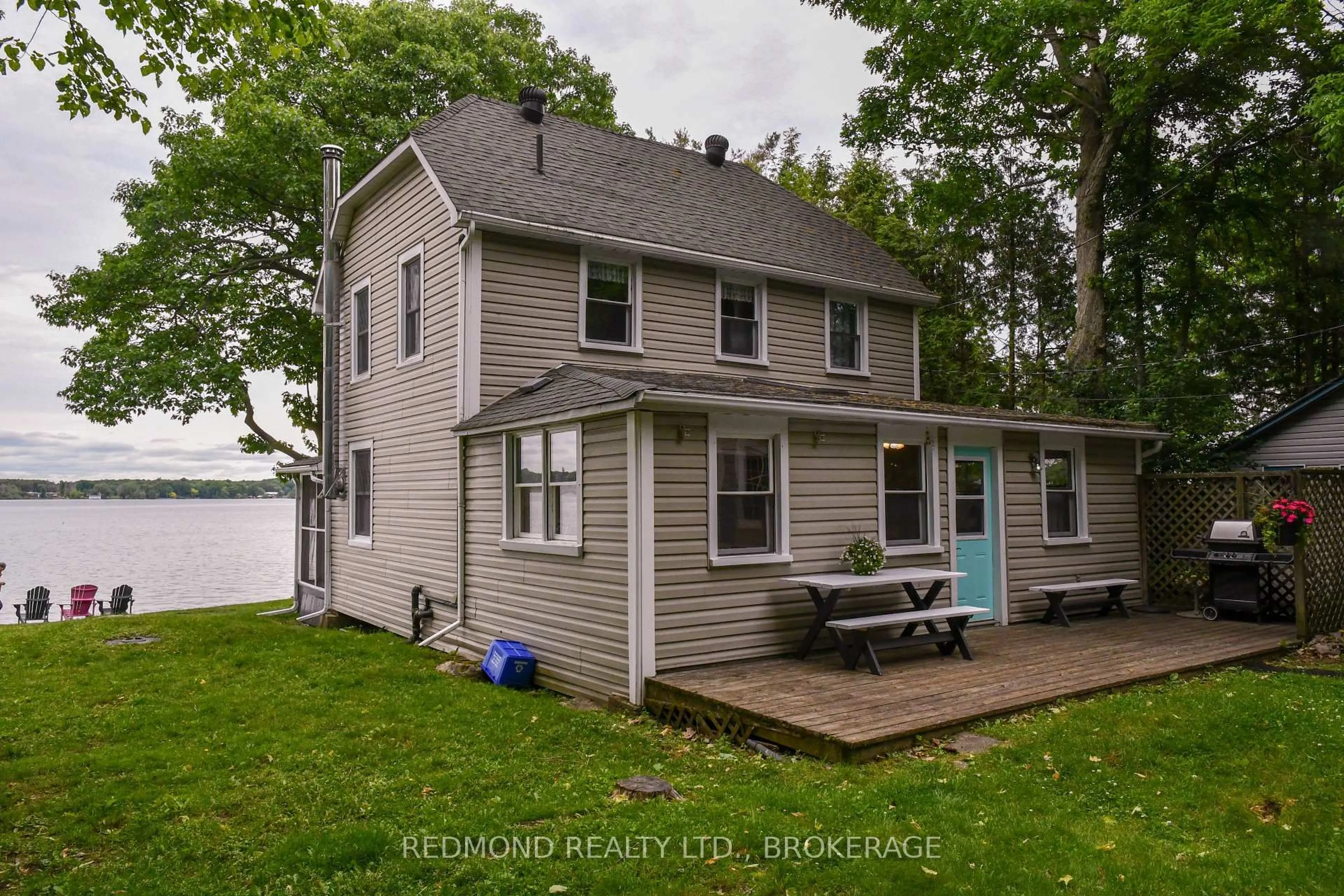 A pic from outside/outdoor area/front of a property/back of a property/a pic from drone, water/lake/river/ocean view for 70 Tremont Park Island, Gananoque Ontario K7G 2V5