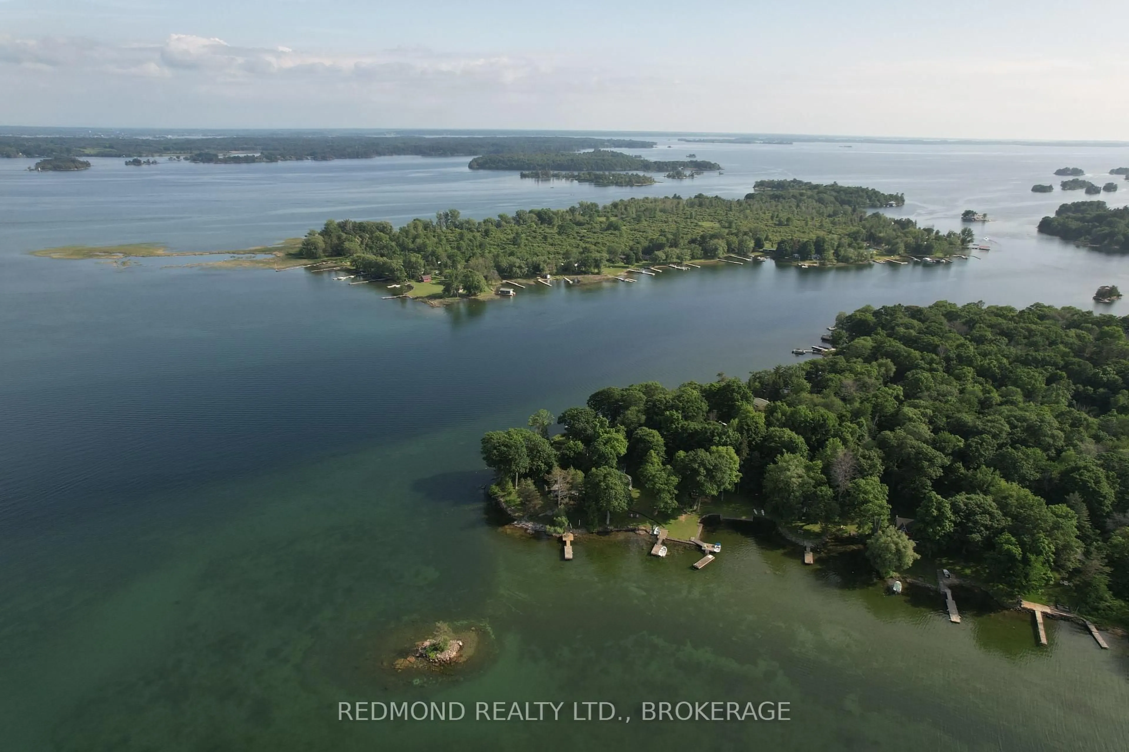 A pic from outside/outdoor area/front of a property/back of a property/a pic from drone, water/lake/river/ocean view for 70 Tremont Park Island, Gananoque Ontario K7G 2V5