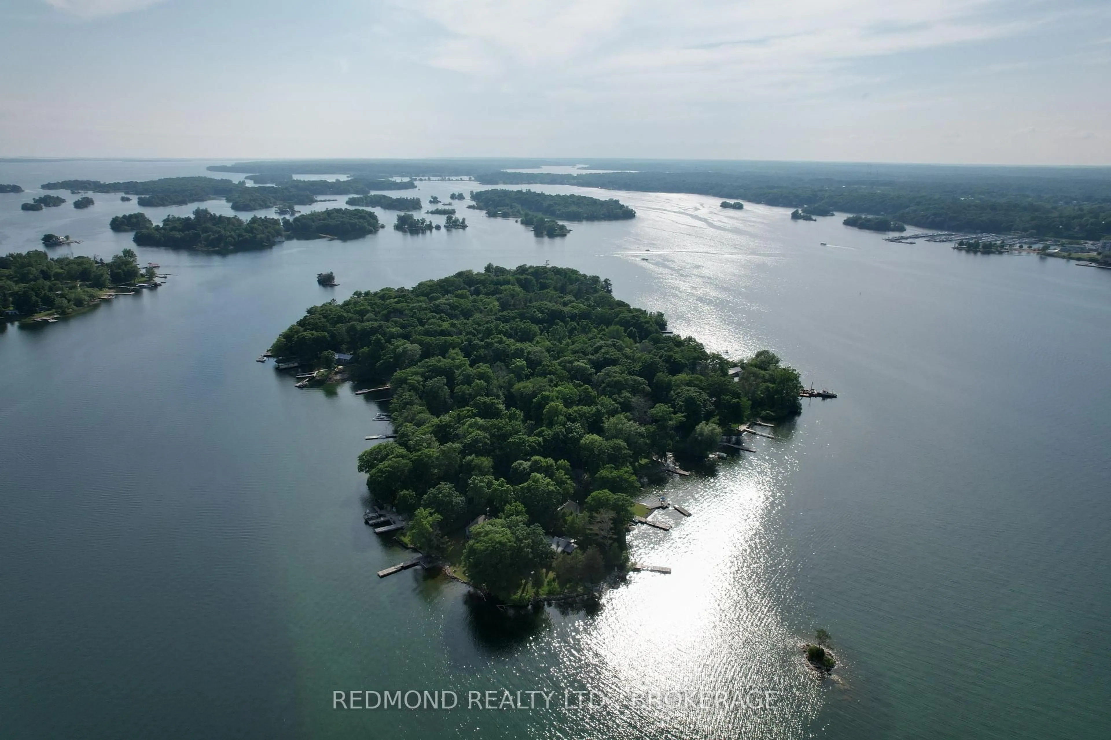 A pic from outside/outdoor area/front of a property/back of a property/a pic from drone, water/lake/river/ocean view for 70 Tremont Park Island, Gananoque Ontario K7G 2V5