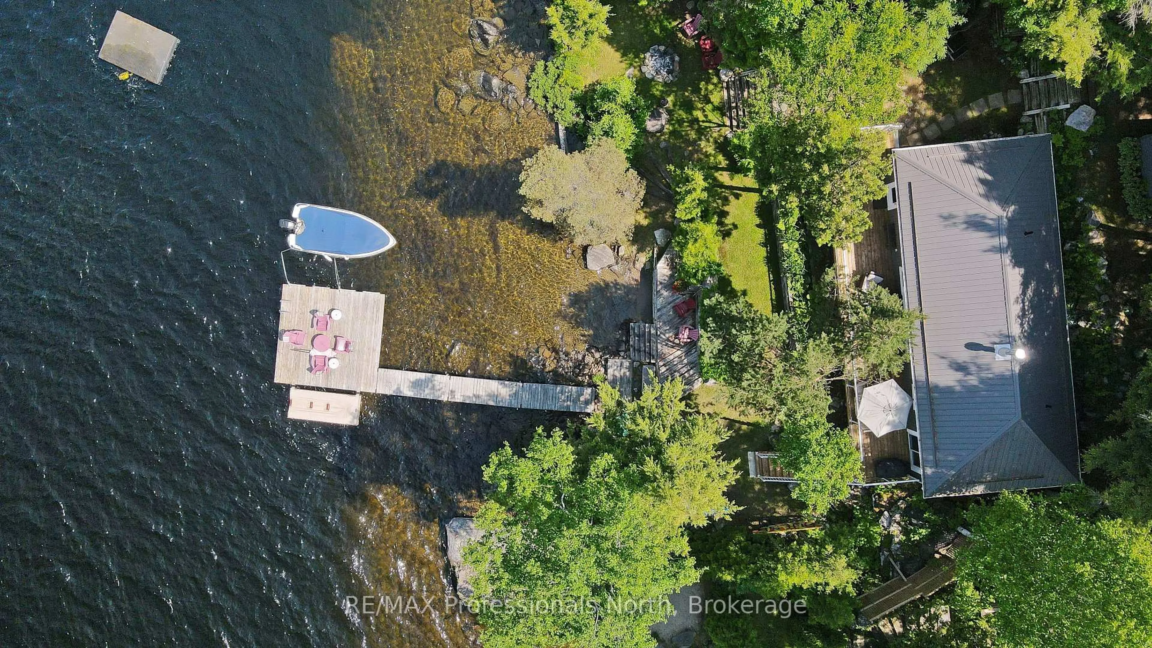 A pic from outside/outdoor area/front of a property/back of a property/a pic from drone, water/lake/river/ocean view for 1336 Grace River Rd, Dysart et al Ontario K0L 2Y0