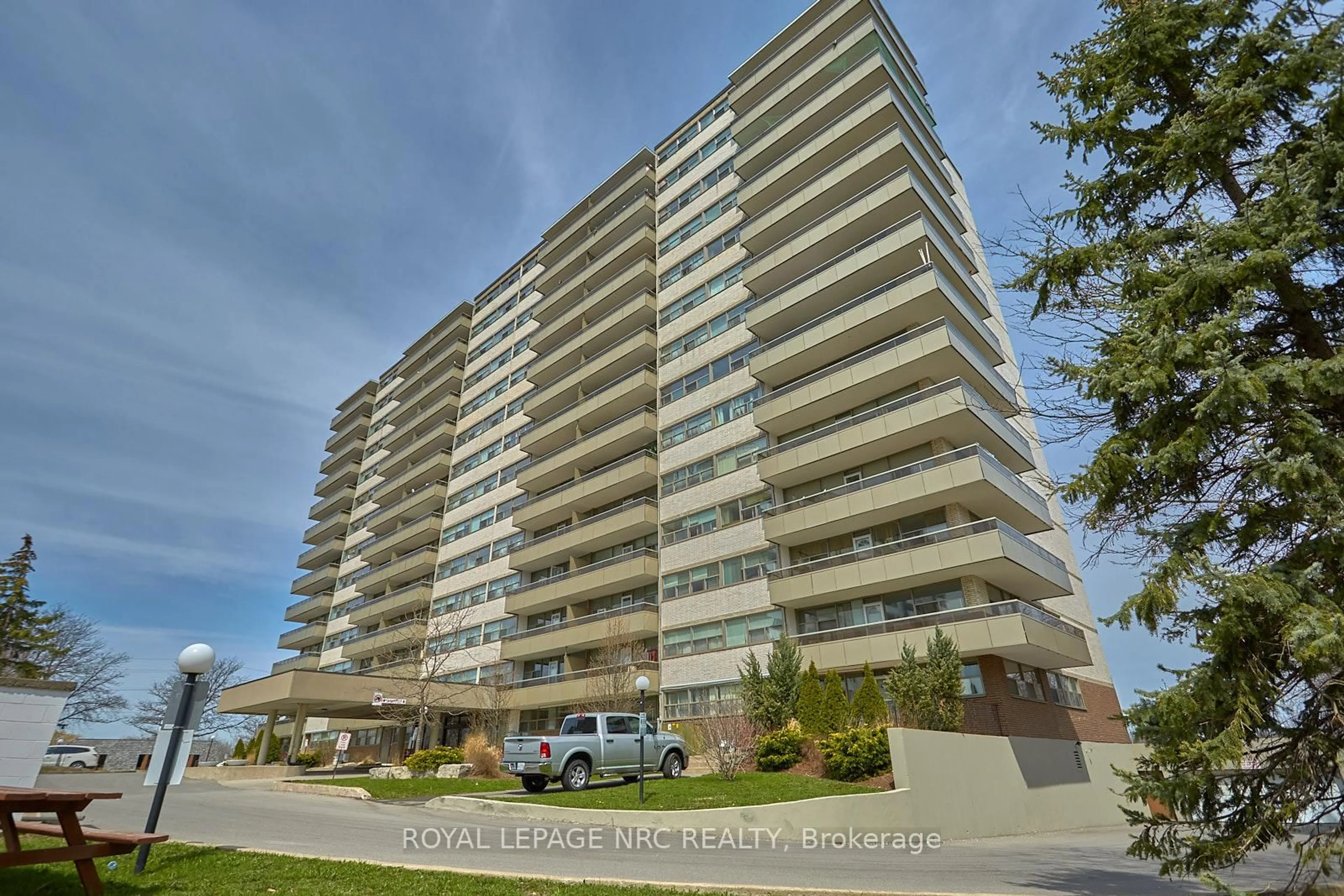 A pic from outside/outdoor area/front of a property/back of a property/a pic from drone, unknown for 215 Glenridge Ave #307, St. Catharines Ontario L2T 3J7