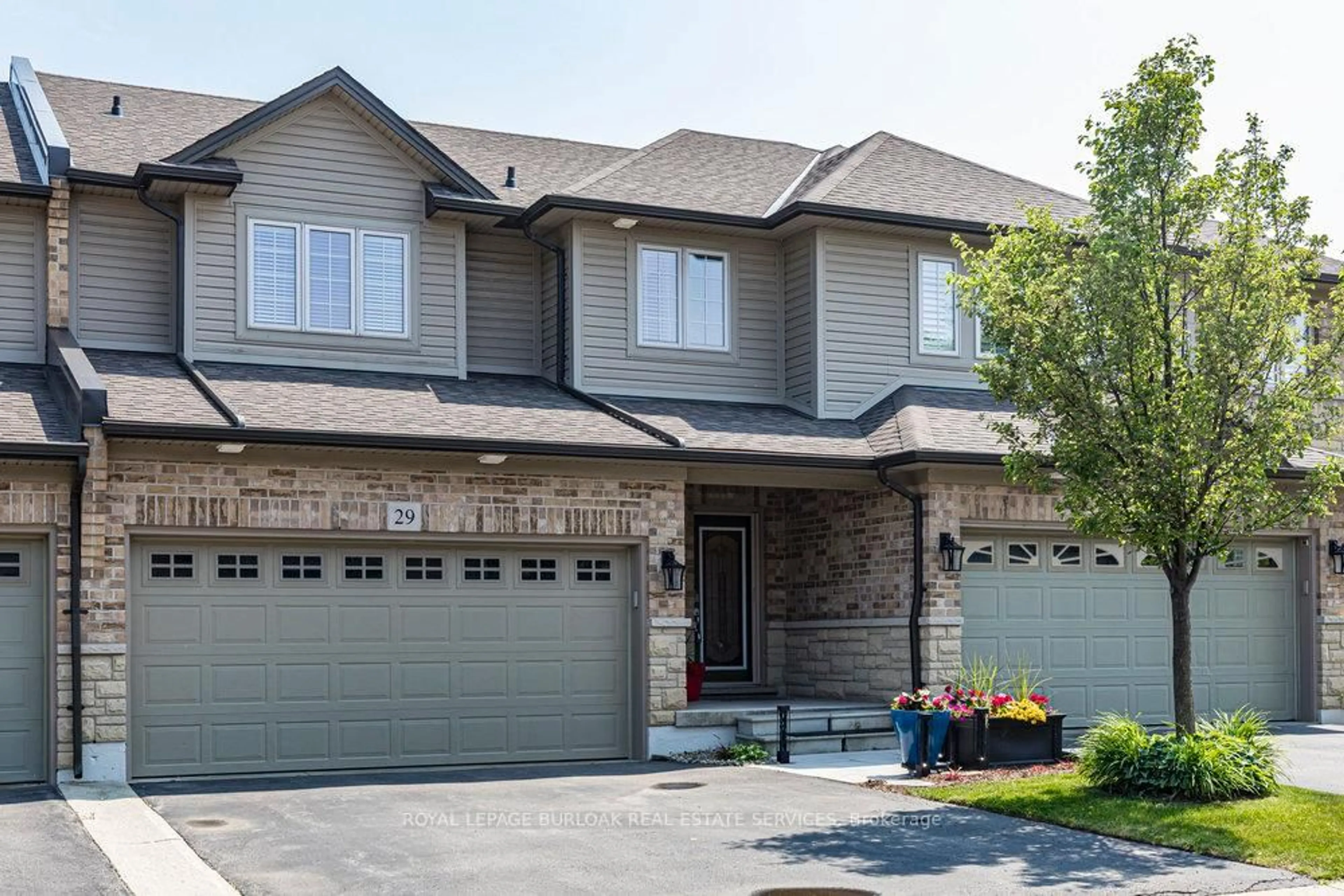 Home with brick exterior material, street for 441 Stonehenge Dr #29, Hamilton Ontario L9K 0B1