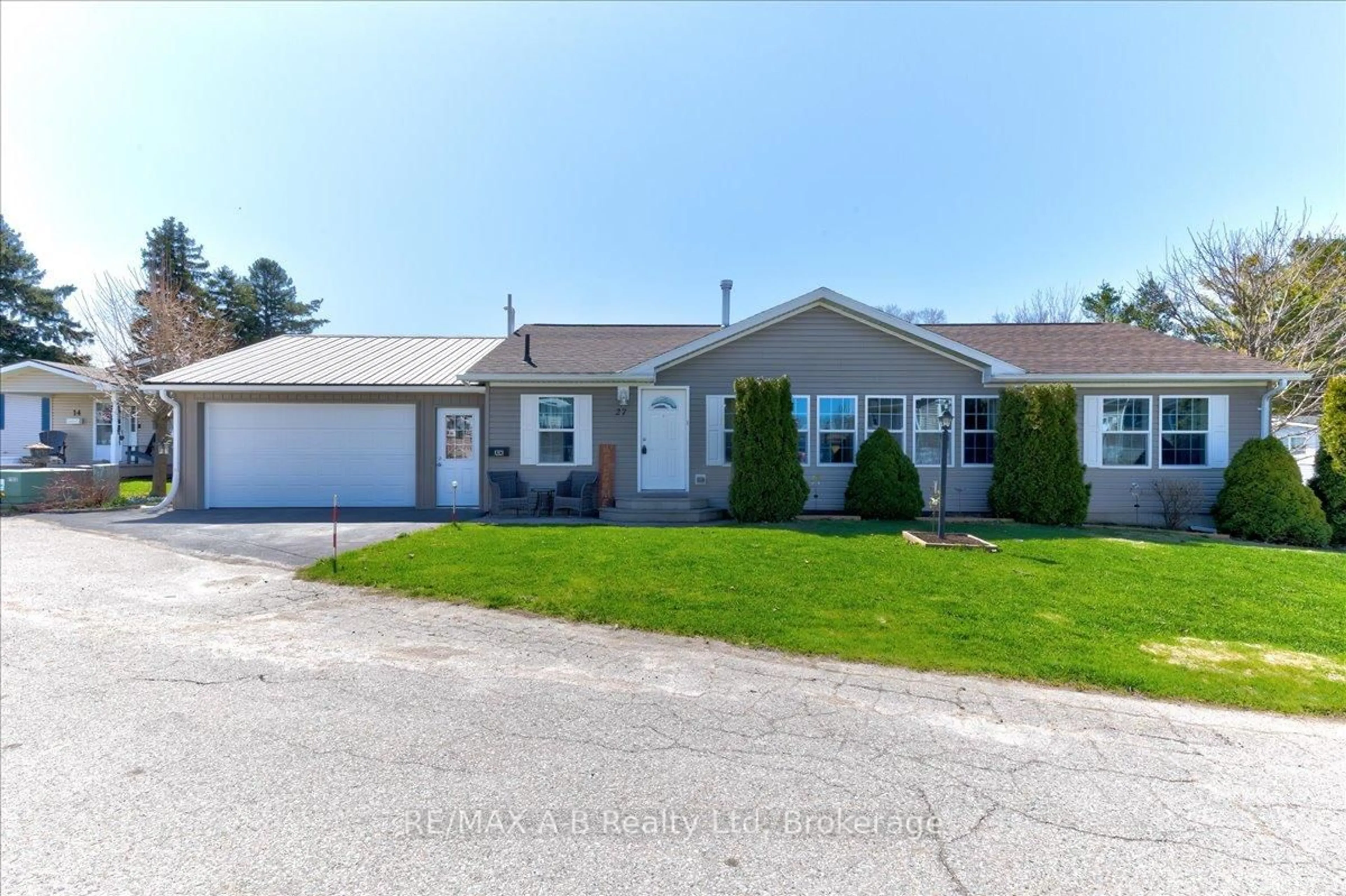 Home with vinyl exterior material, street for 25 Thames Rd #27, St. Marys Ontario N4X 1C4