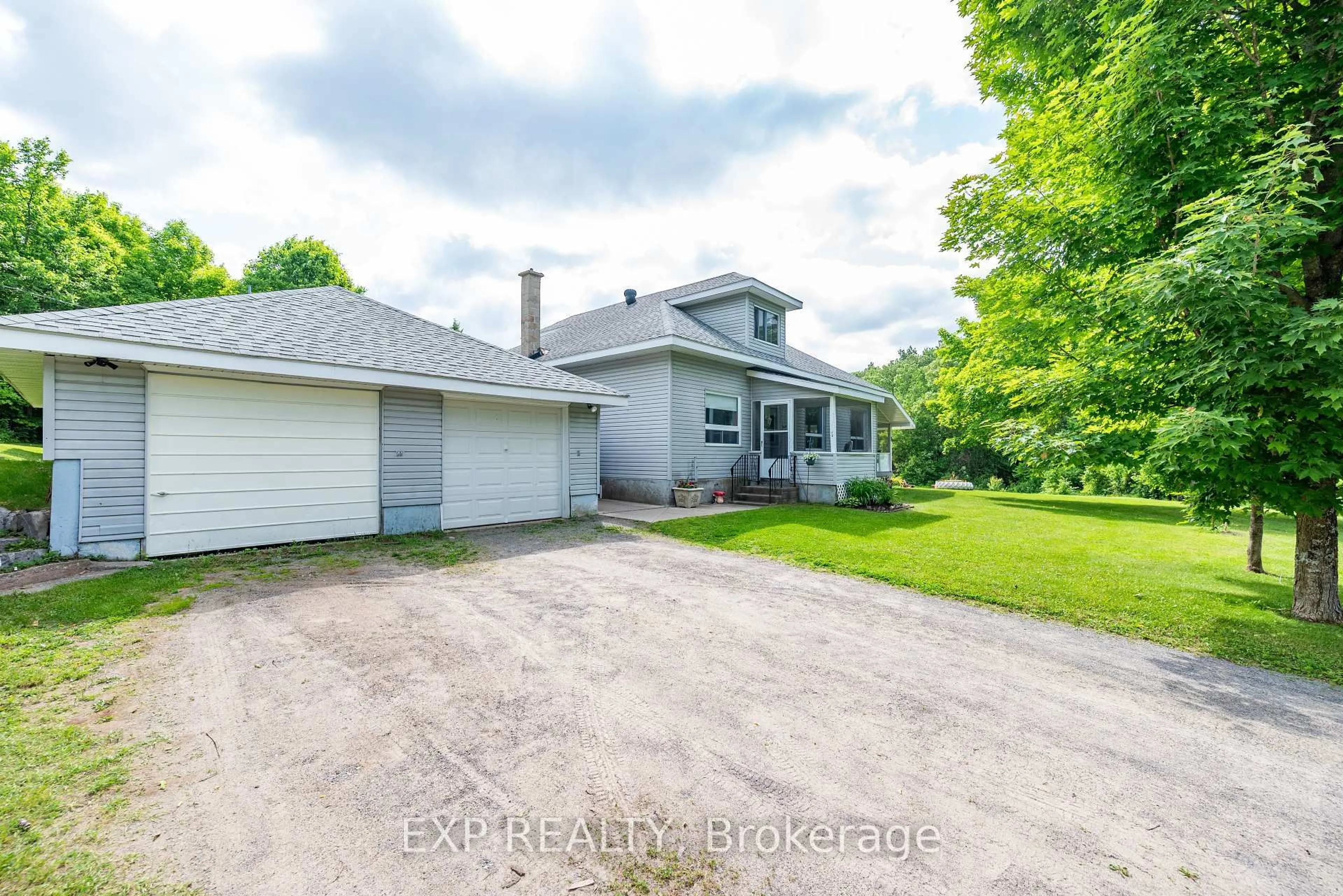 A pic from outside/outdoor area/front of a property/back of a property/a pic from drone, street for 1618 Flat Rd, Dacre Ontario K0J 1N0