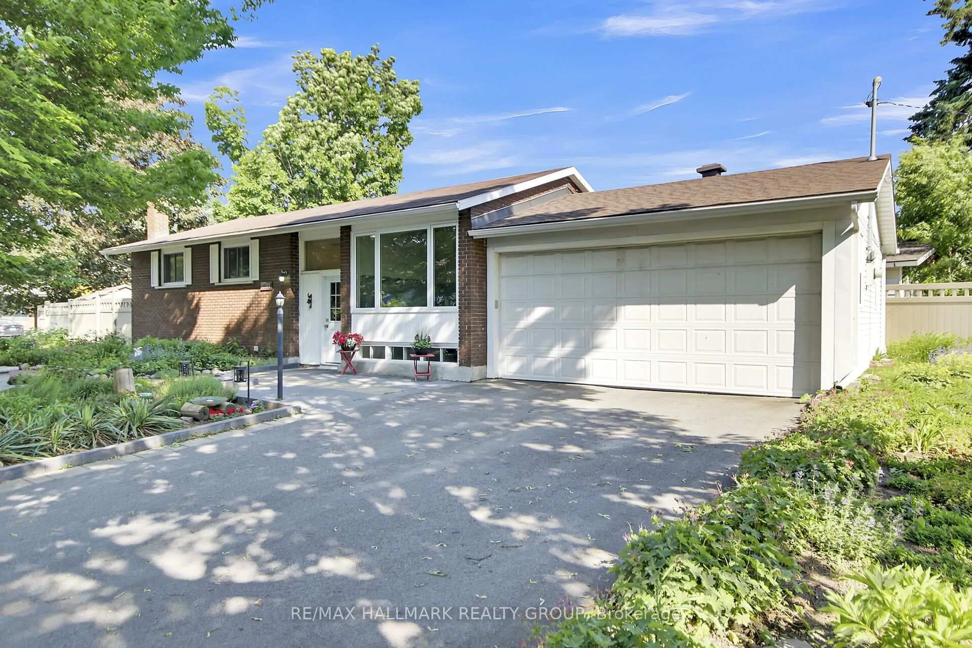 Home with brick exterior material, street for 2286 Elmira Dr, Ottawa Ontario K2C 1H4