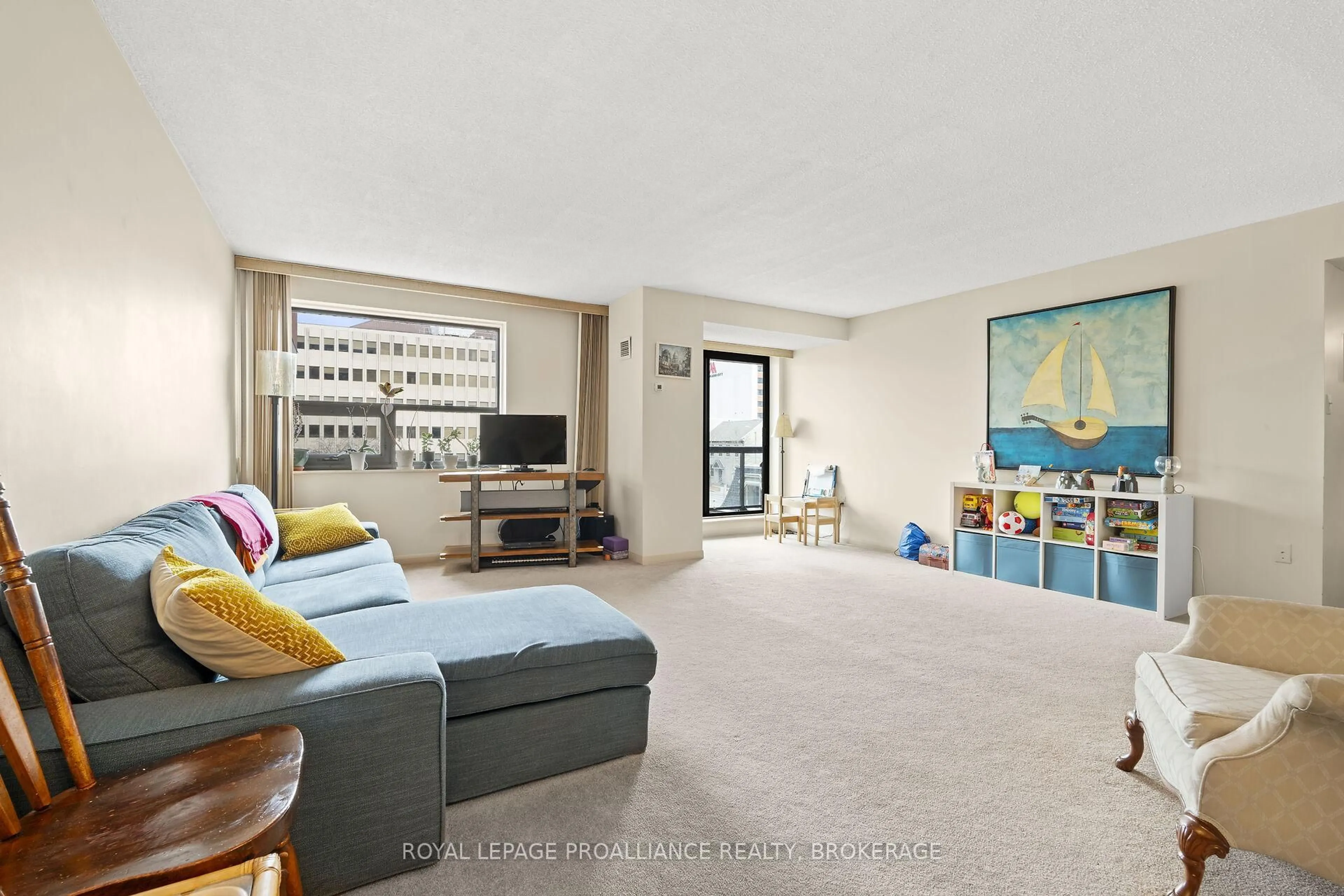Living room with furniture, unknown for 165 Ontario St #309, Kingston Ontario K7L 2Y6