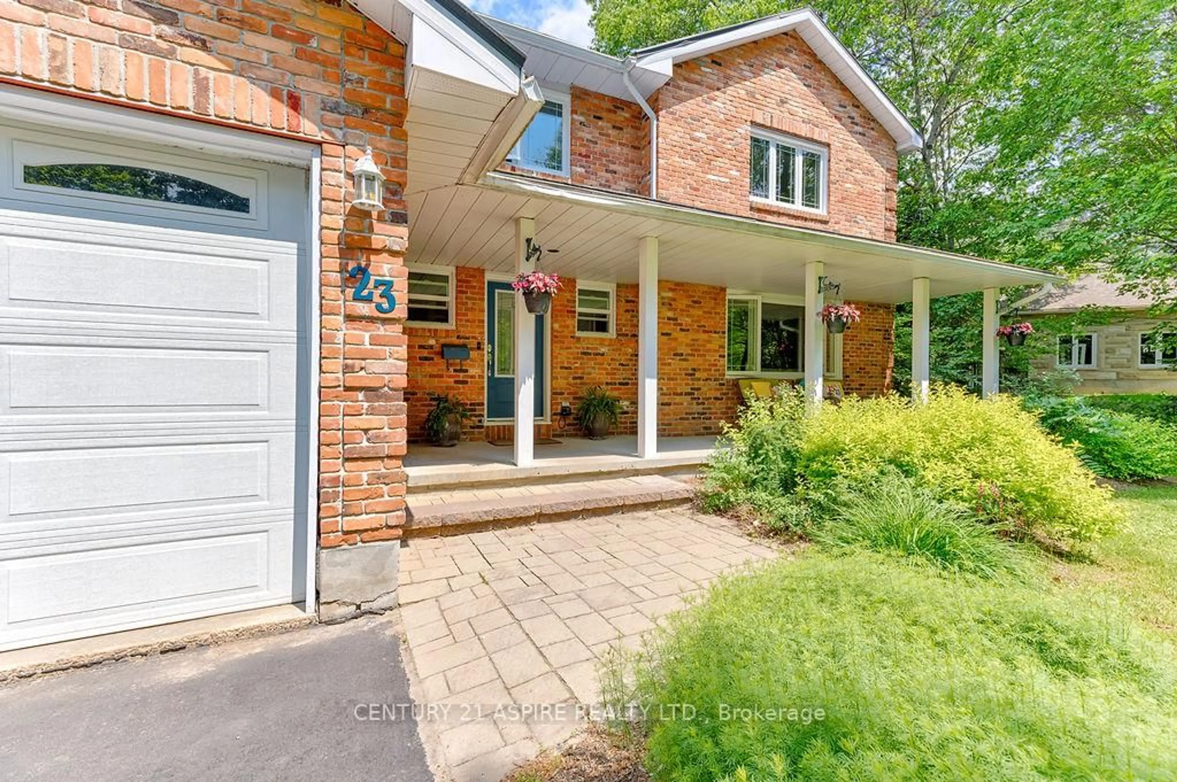 Home with brick exterior material, street for 23 Country Lane, Petawawa Ontario K8H 3E2