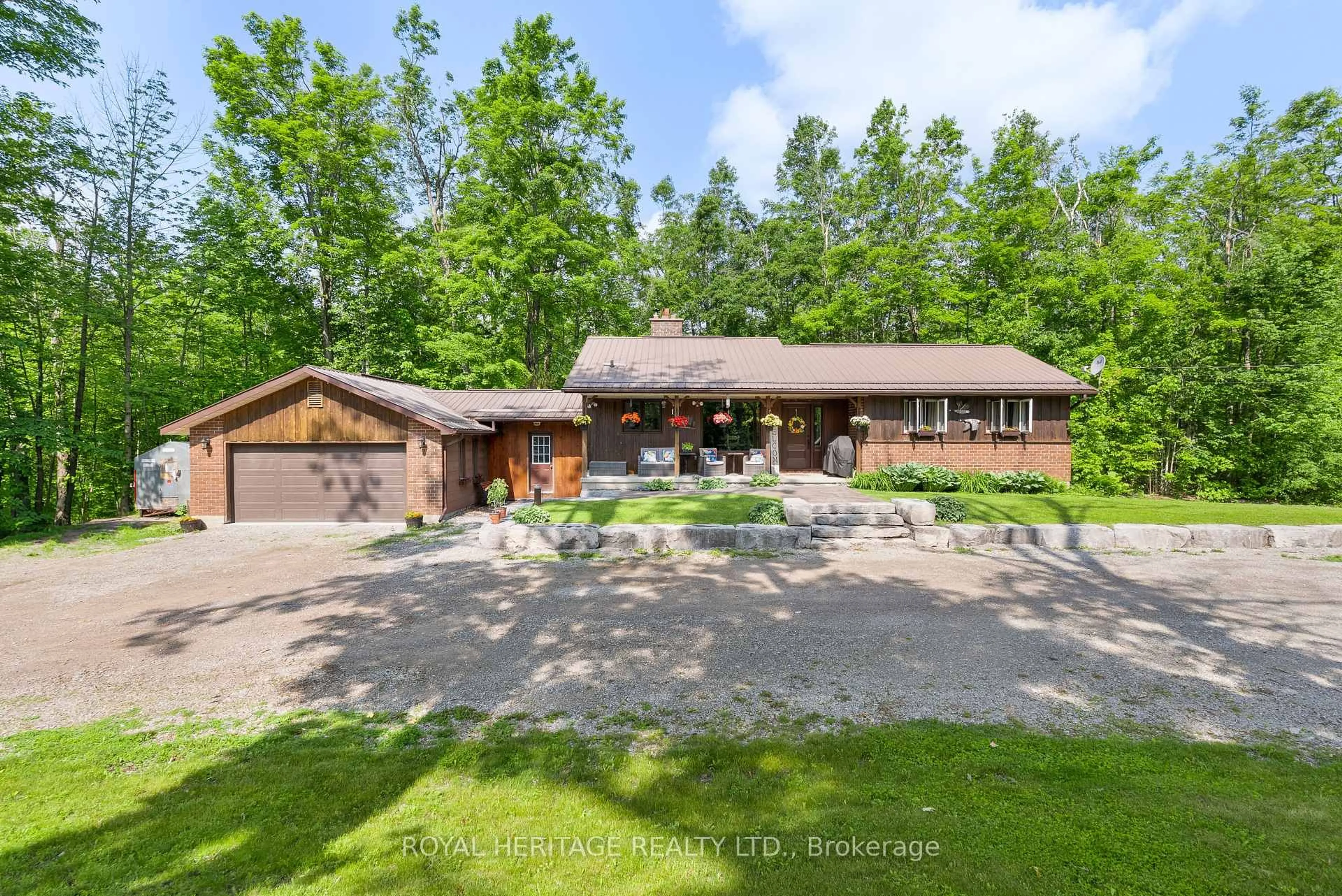 A pic from outside/outdoor area/front of a property/back of a property/a pic from drone, unknown for 65 Bessie Ave, Trent Lakes Ontario K0M 1A0