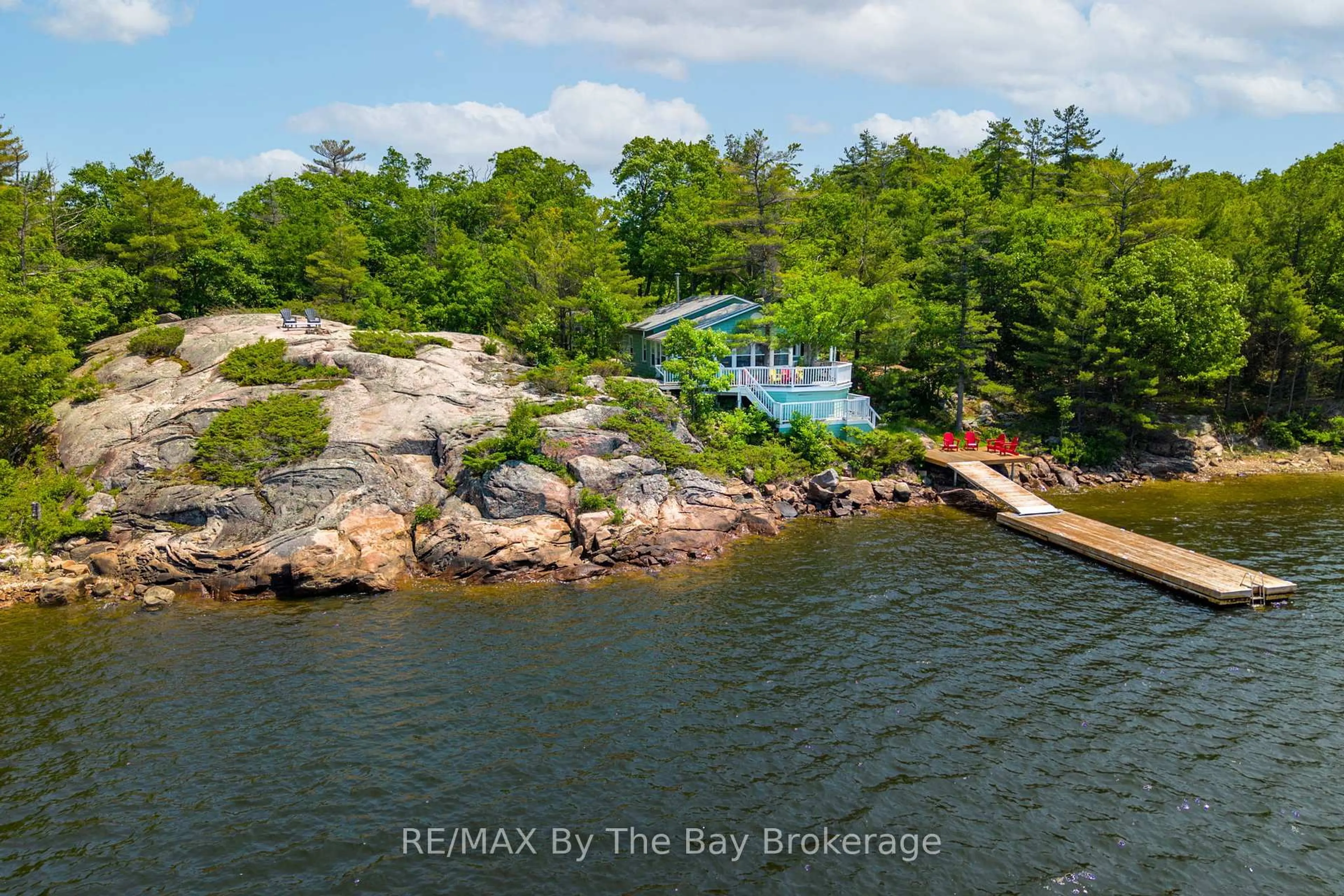 A pic from outside/outdoor area/front of a property/back of a property/a pic from drone, water/lake/river/ocean view for 3572 Island 820/Mermaid Island, Georgian Bay Ontario P0E 1E0