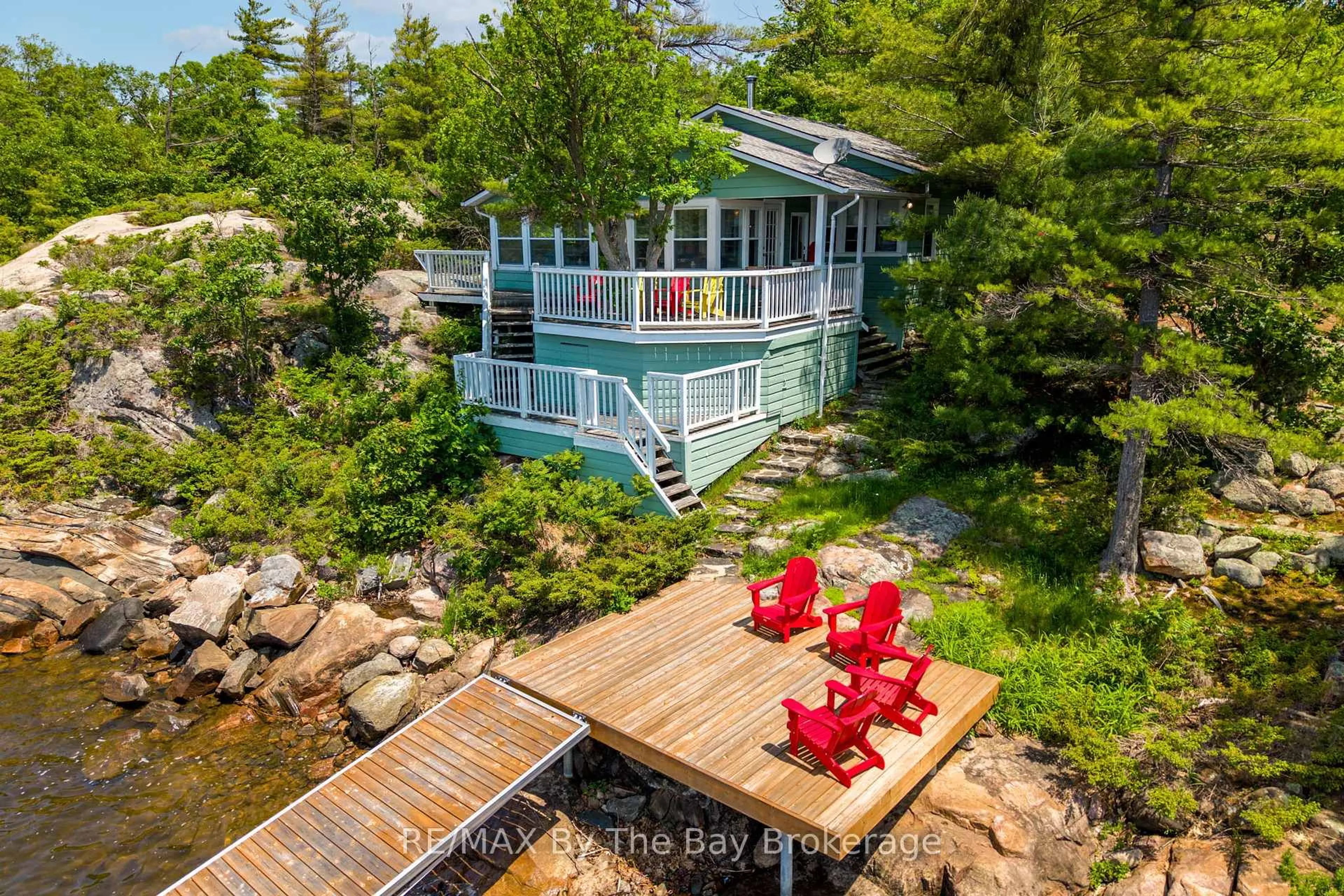 A pic from outside/outdoor area/front of a property/back of a property/a pic from drone, water/lake/river/ocean view for 3572 Island 820/Mermaid Island, Georgian Bay Ontario P0E 1E0
