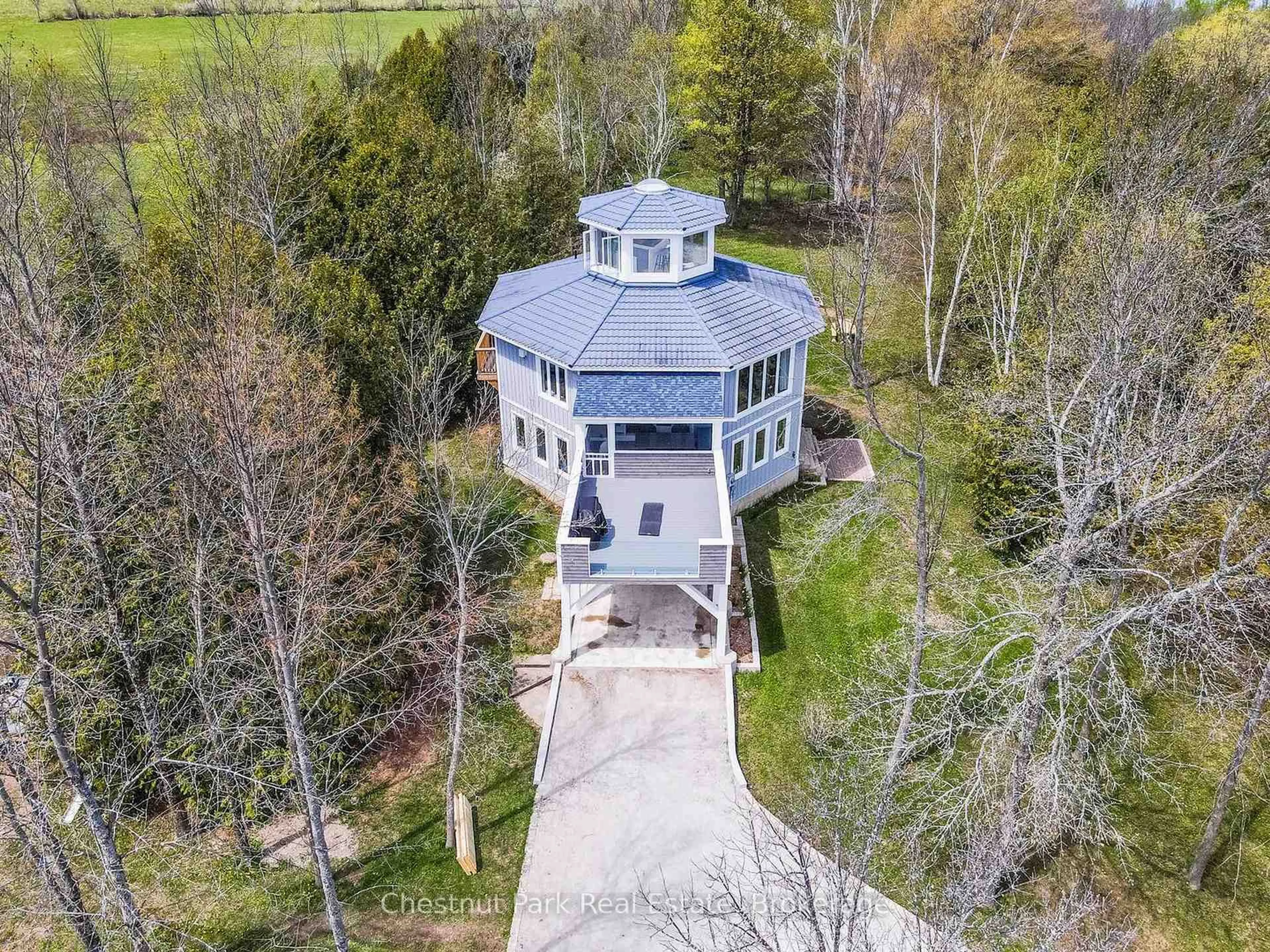 A pic from outside/outdoor area/front of a property/back of a property/a pic from drone, building for 504066 Grey Road 1, Georgian Bluffs Ontario N0H 2T0