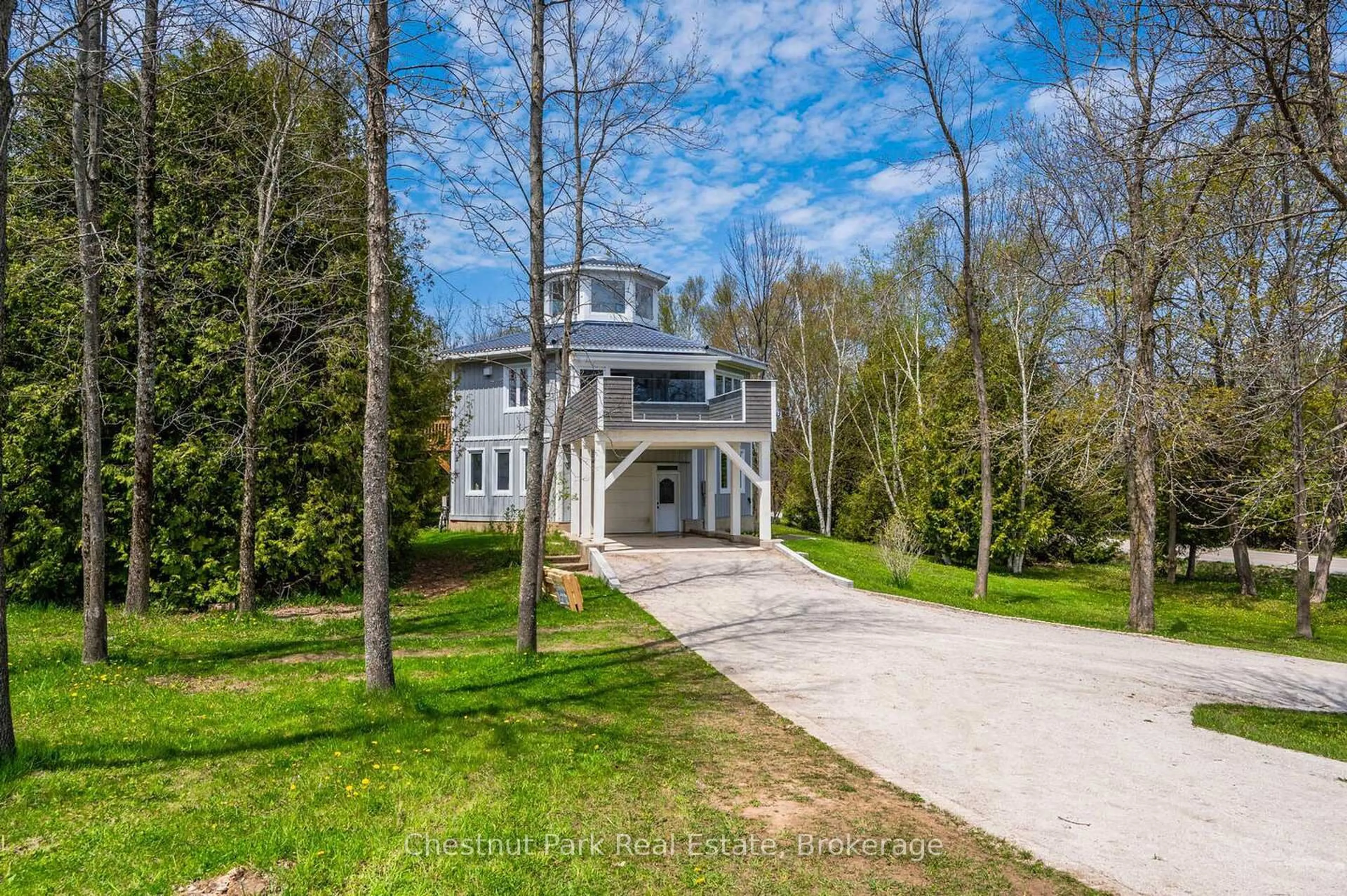 A pic from outside/outdoor area/front of a property/back of a property/a pic from drone, unknown for 504066 Grey Road 1, Georgian Bluffs Ontario N0H 2T0