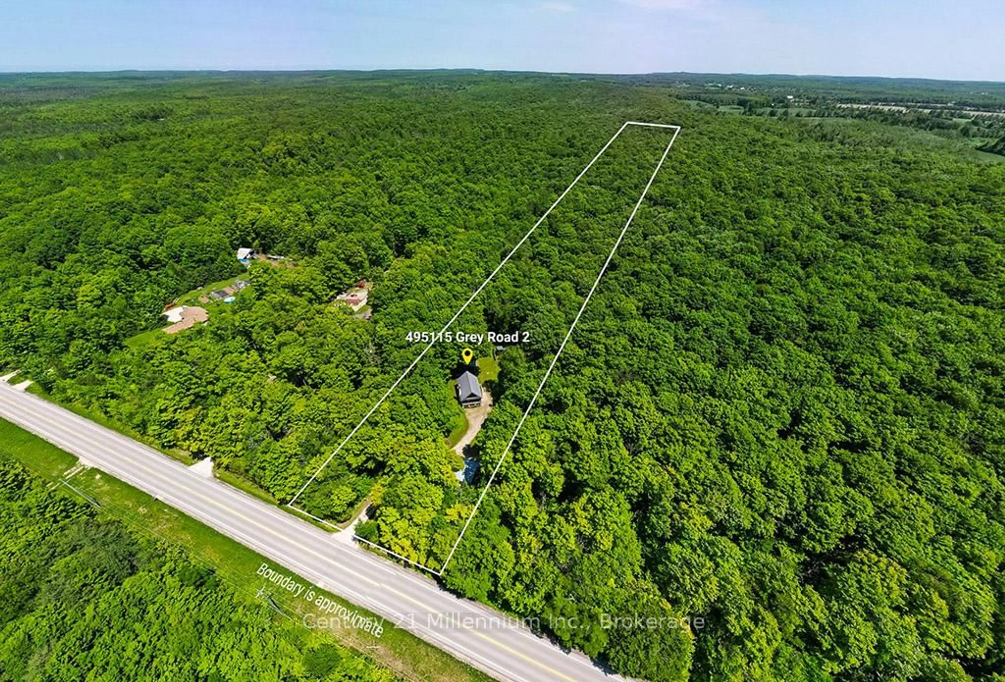 A pic from outside/outdoor area/front of a property/back of a property/a pic from drone, forest/trees view for 495115 Grey 2 Rd, Blue Mountains Ontario N0H 2E0