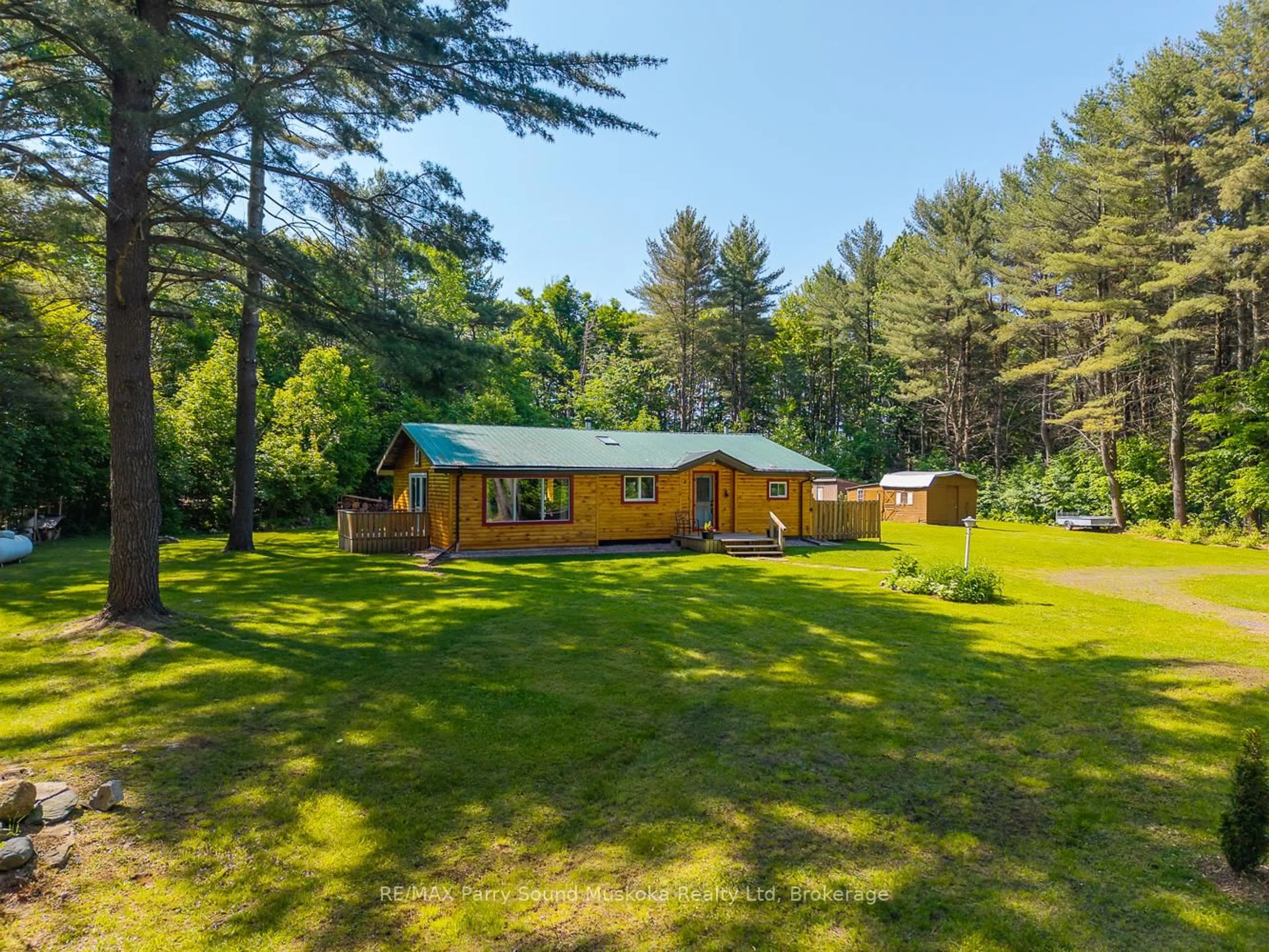 A pic from outside/outdoor area/front of a property/back of a property/a pic from drone, forest/trees view for 7 Municipal Dr, McDougall Ontario P2A 2W9