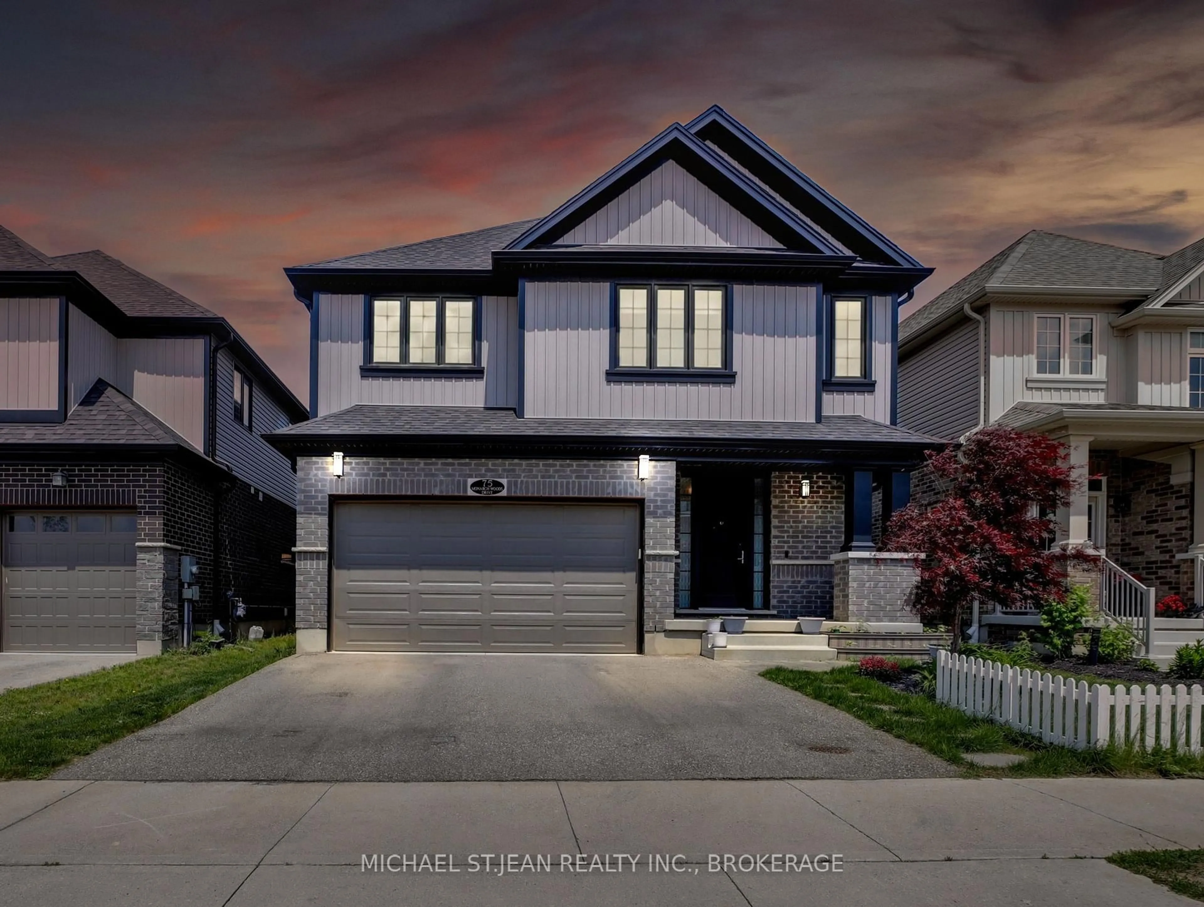 Home with vinyl exterior material, street for 75 Monarch Woods Dr, Kitchener Ontario N2P 0K1