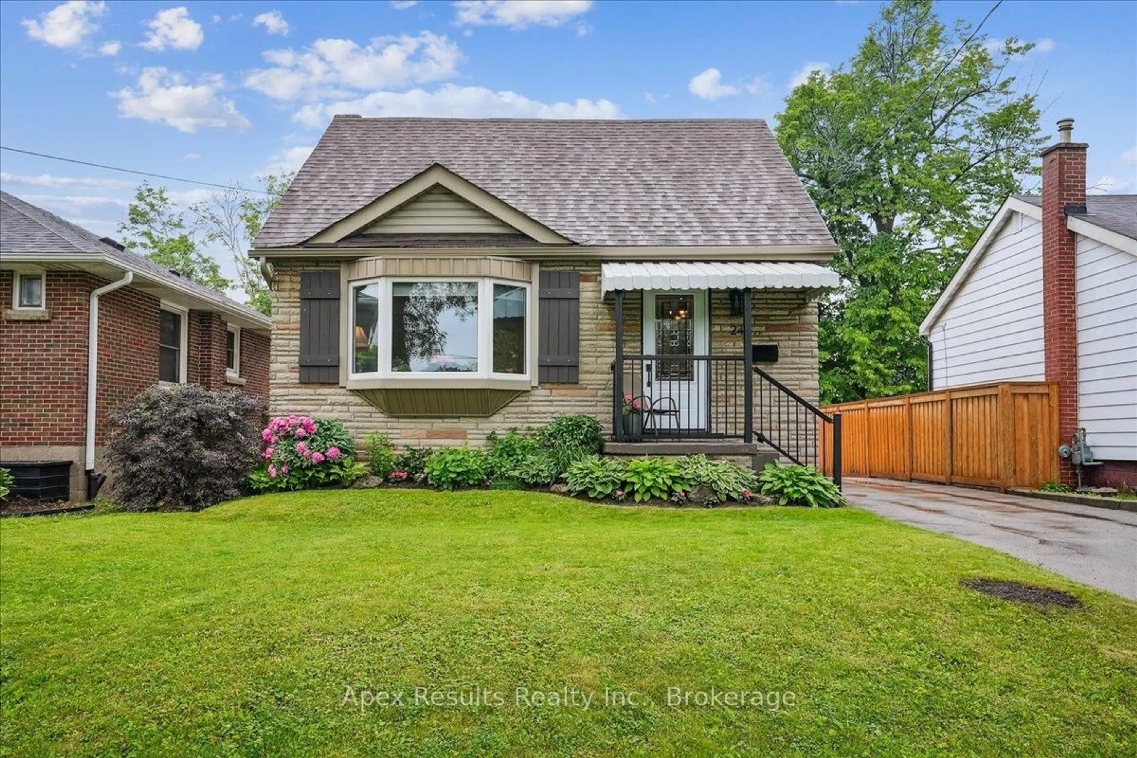 Home with brick exterior material, street for 246 East 43rd St, Hamilton Ontario L8T 3C5