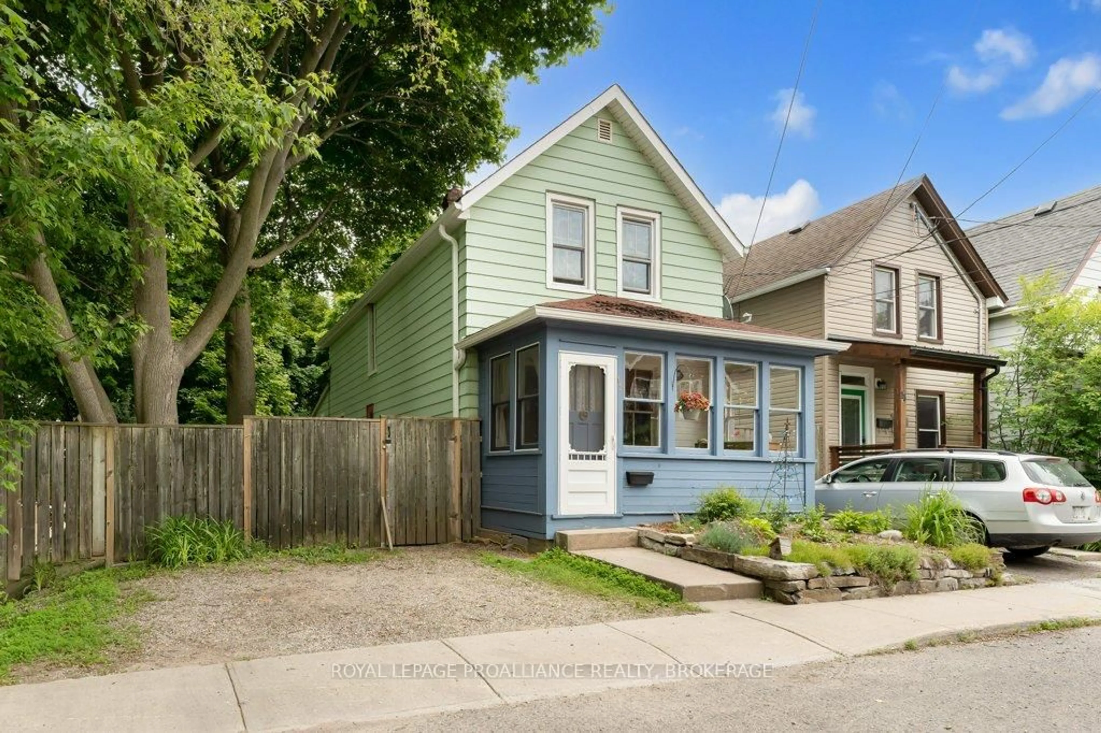 Home with vinyl exterior material, street for 15 St Catherine St, Kingston Ontario K7K 3R9