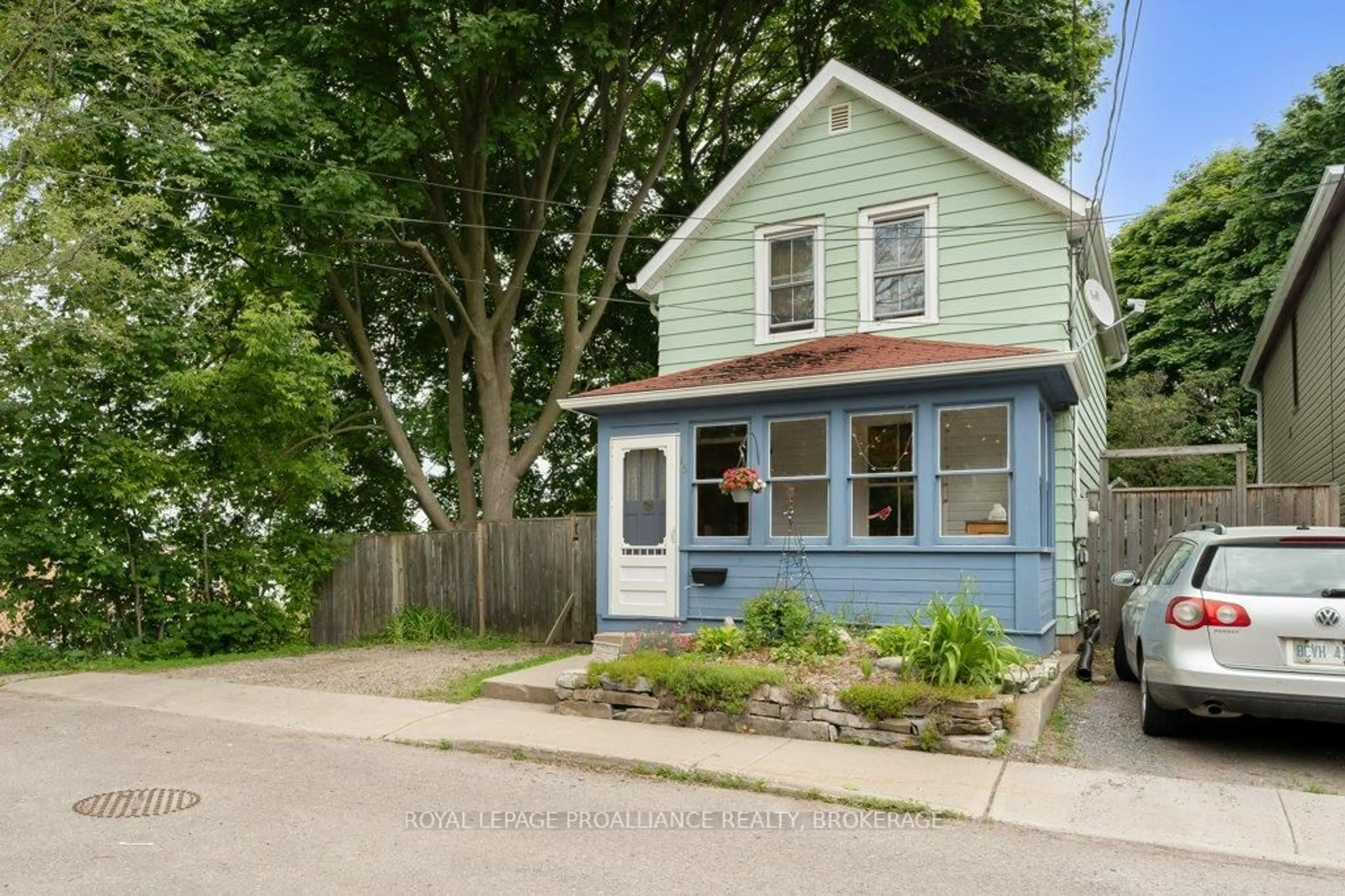 Home with vinyl exterior material, street for 15 St Catherine St, Kingston Ontario K7K 3R9
