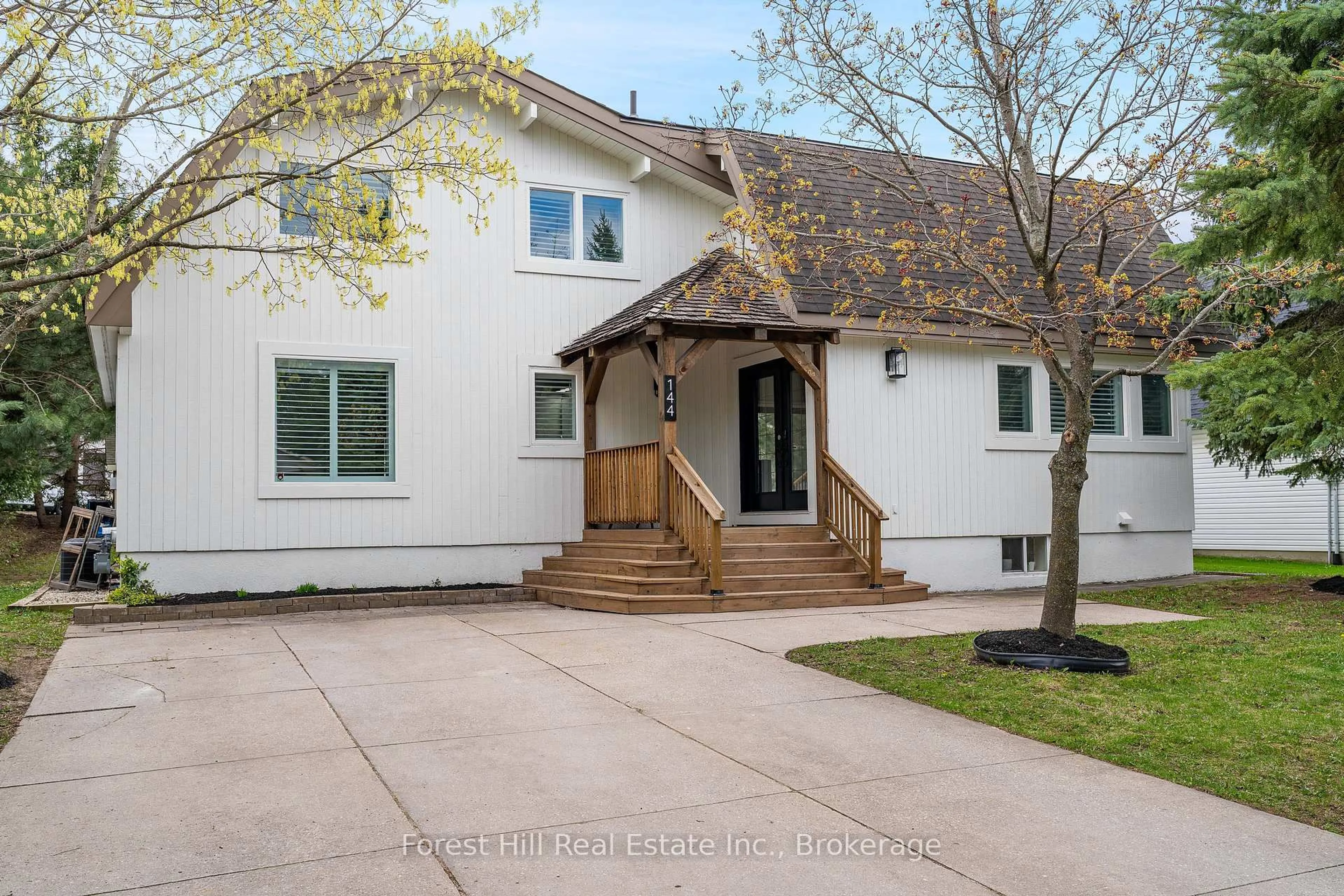 Home with brick exterior material, street for 144 Brooker Blvd, Blue Mountains Ontario L9Y 0L4