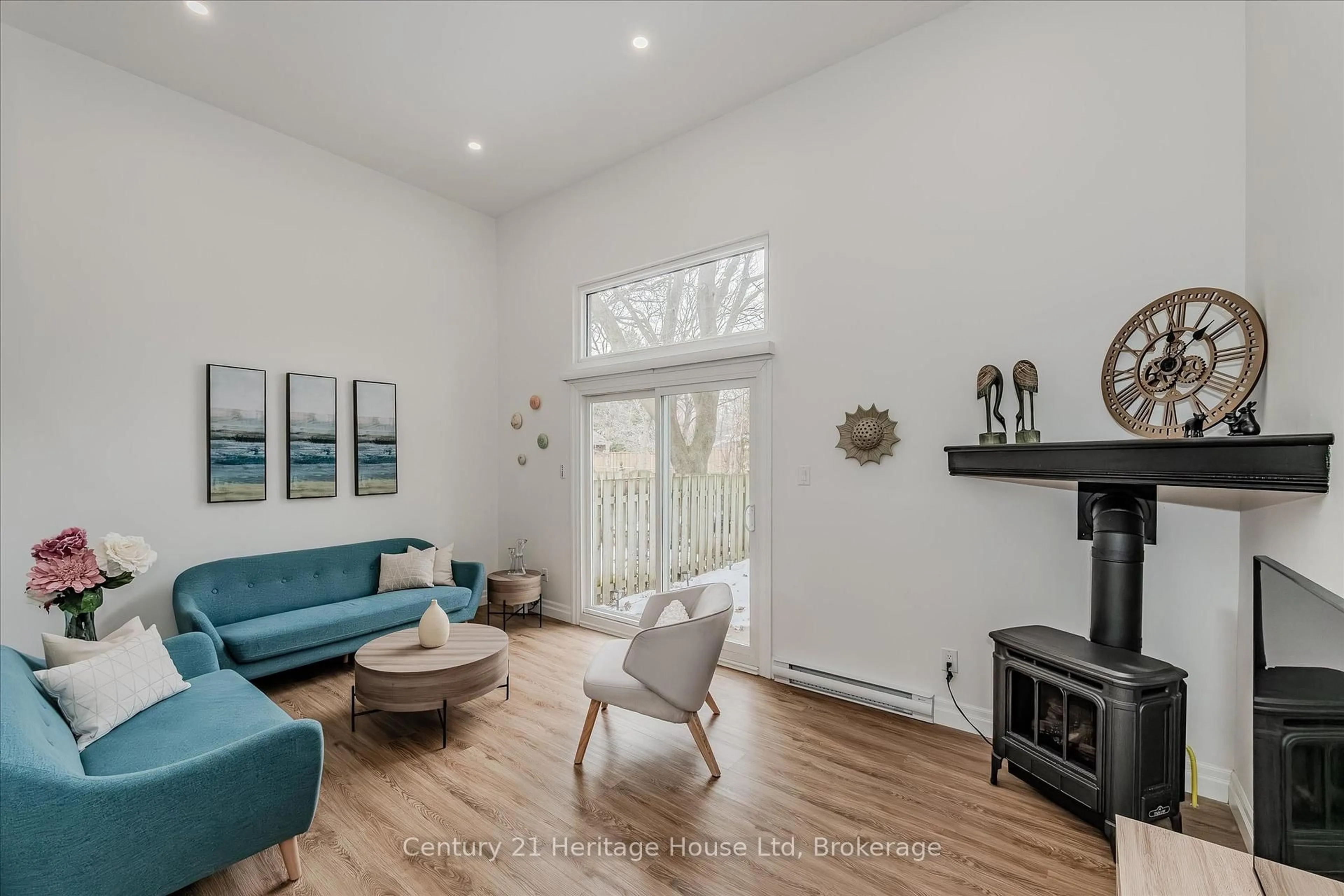 Living room with furniture, wood/laminate floor for 2 Worton Ave #10, Guelph Ontario N1H 7C5
