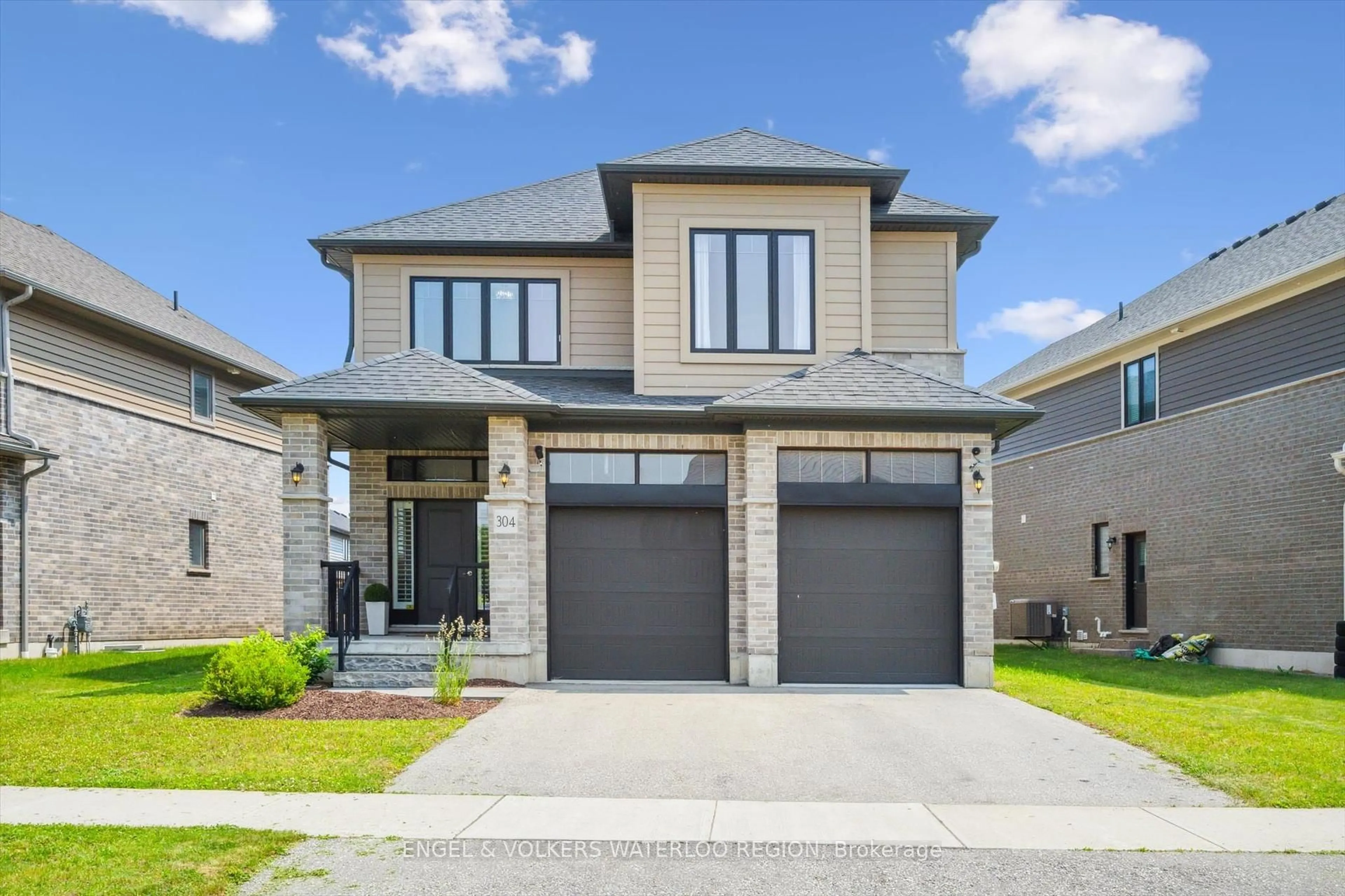 Home with brick exterior material, street for 304 Carriage Way, Waterloo Ontario N2K 0C2
