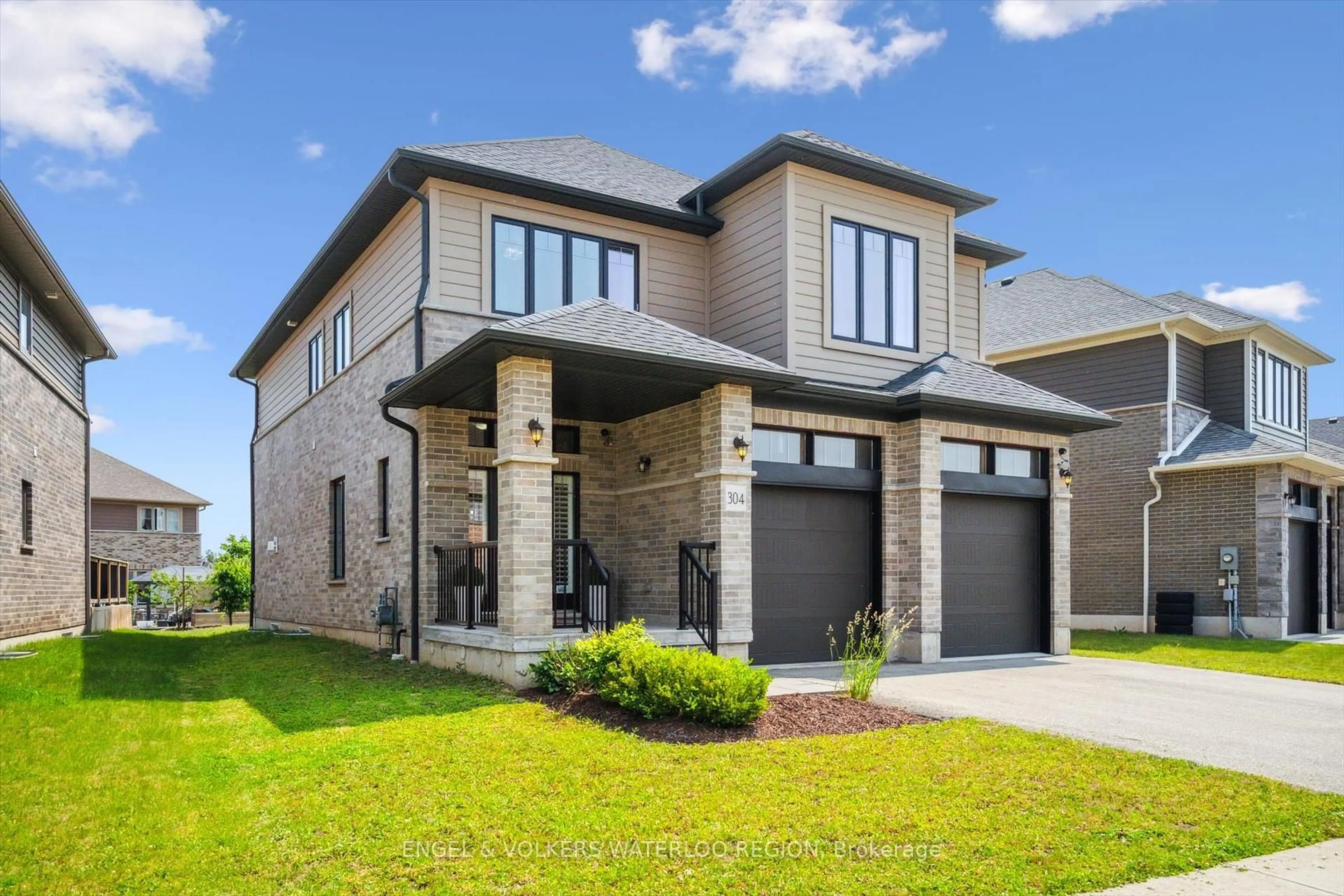 Home with brick exterior material, street for 304 Carriage Way, Waterloo Ontario N2K 0C2