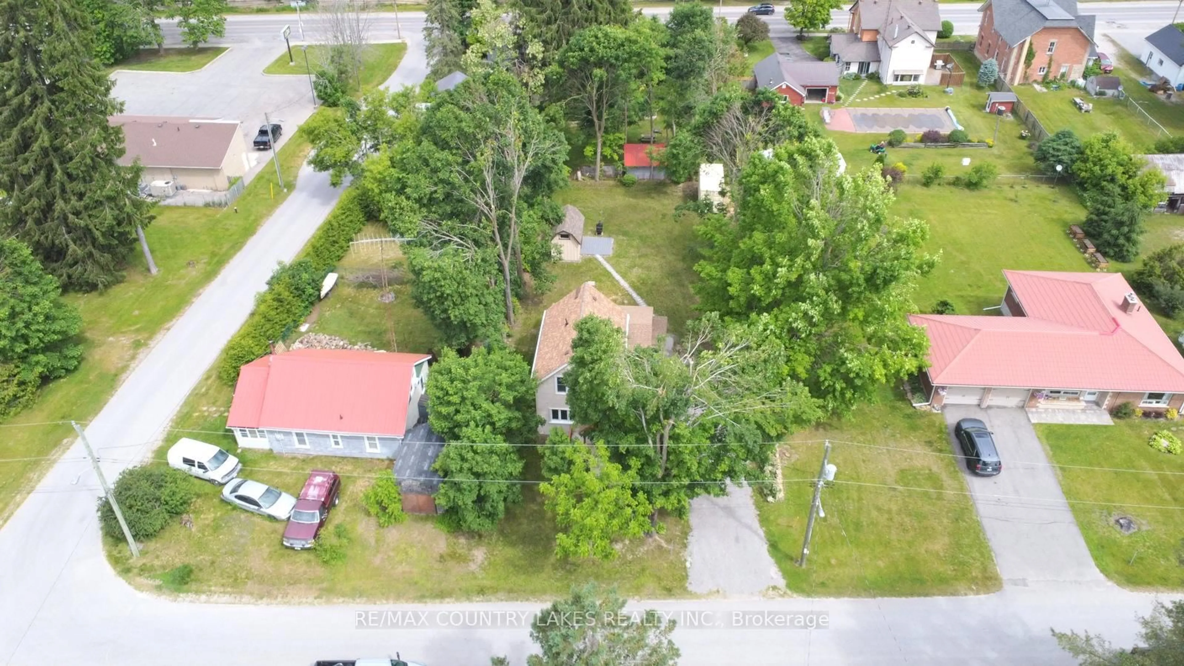 A pic from outside/outdoor area/front of a property/back of a property/a pic from drone, street for 18 John St, Kawartha Lakes Ontario K0M 2B0