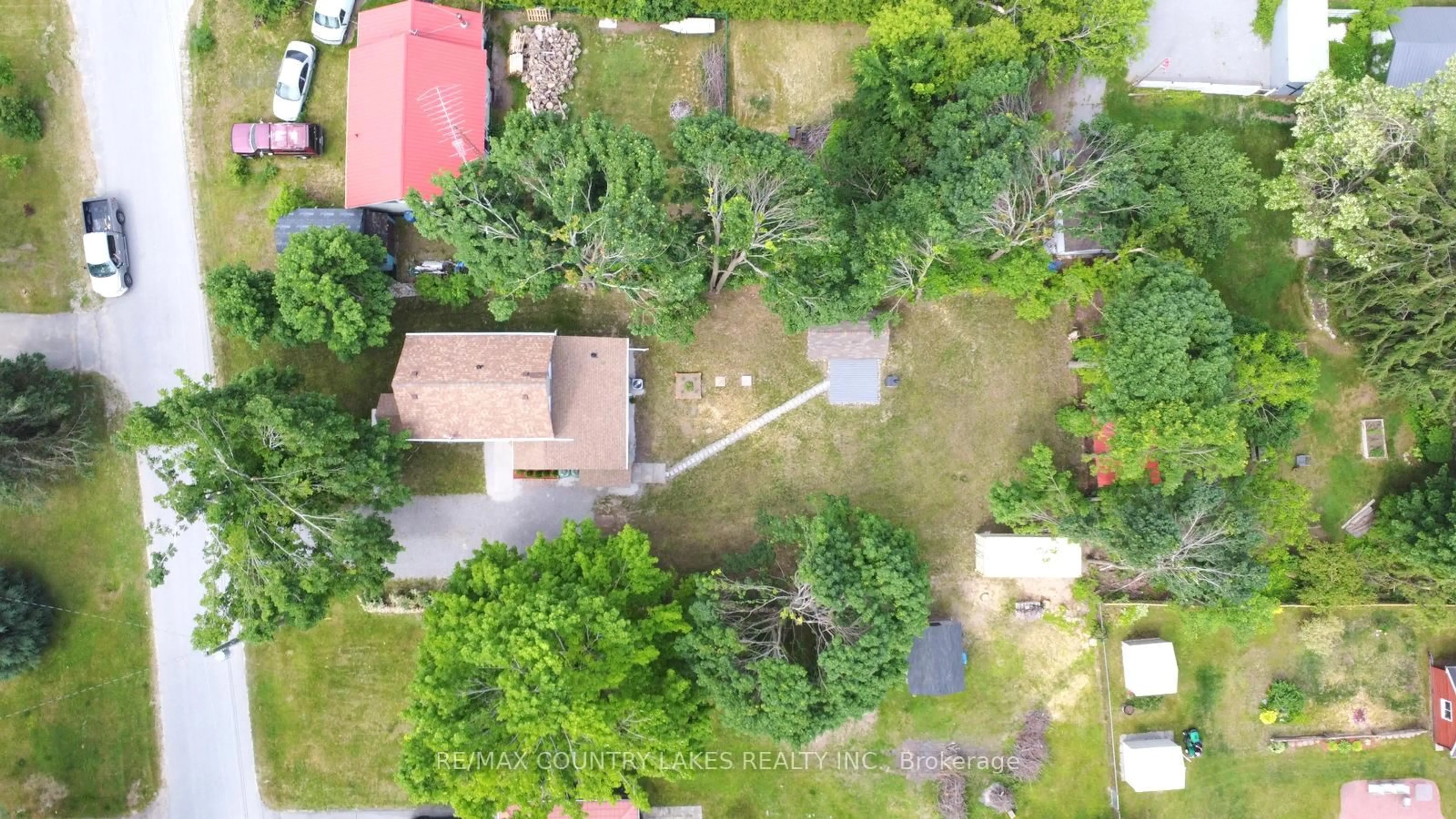A pic from outside/outdoor area/front of a property/back of a property/a pic from drone, street for 18 John St, Kawartha Lakes Ontario K0M 2B0