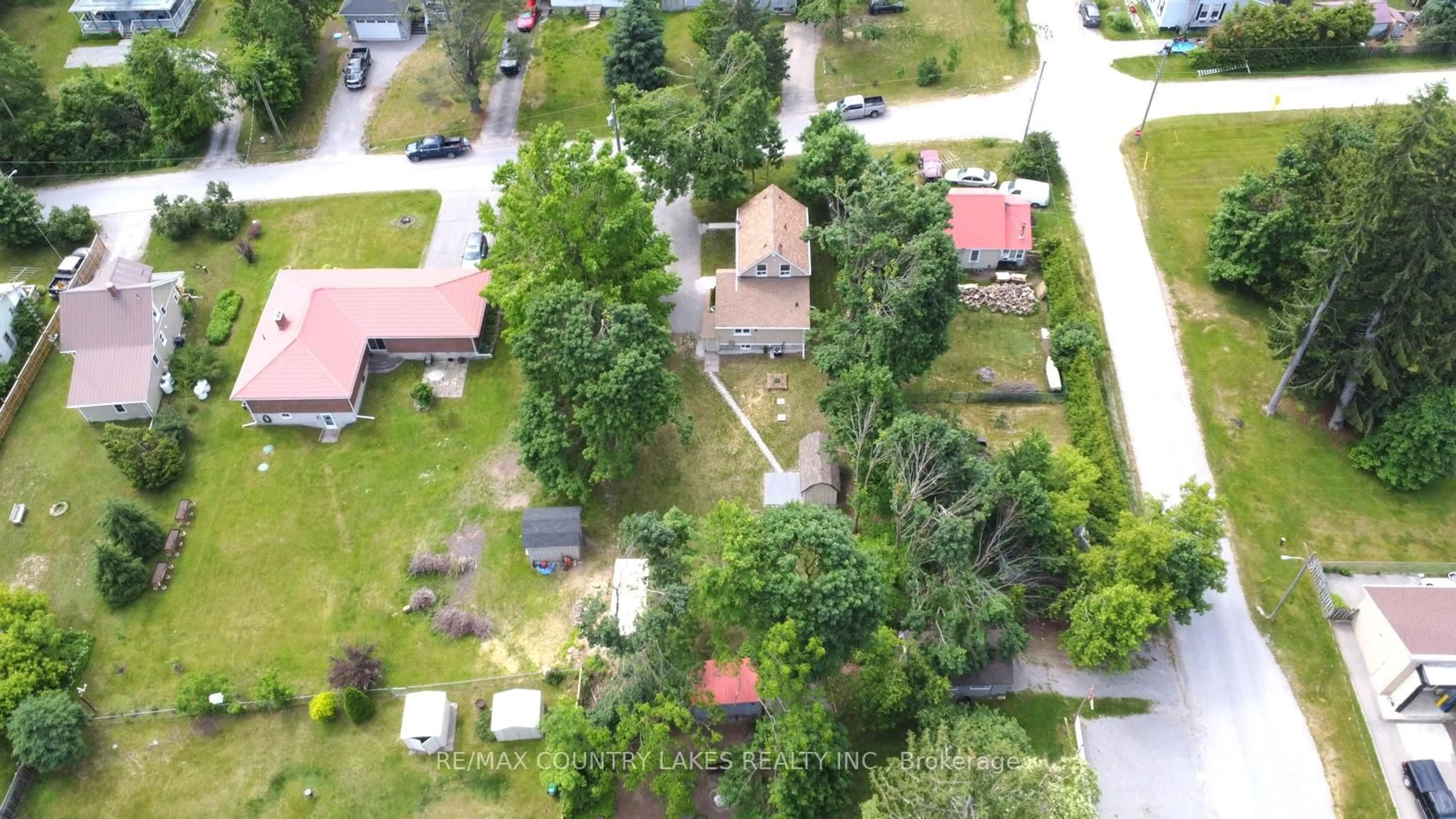 A pic from outside/outdoor area/front of a property/back of a property/a pic from drone, street for 18 John St, Kawartha Lakes Ontario K0M 2B0