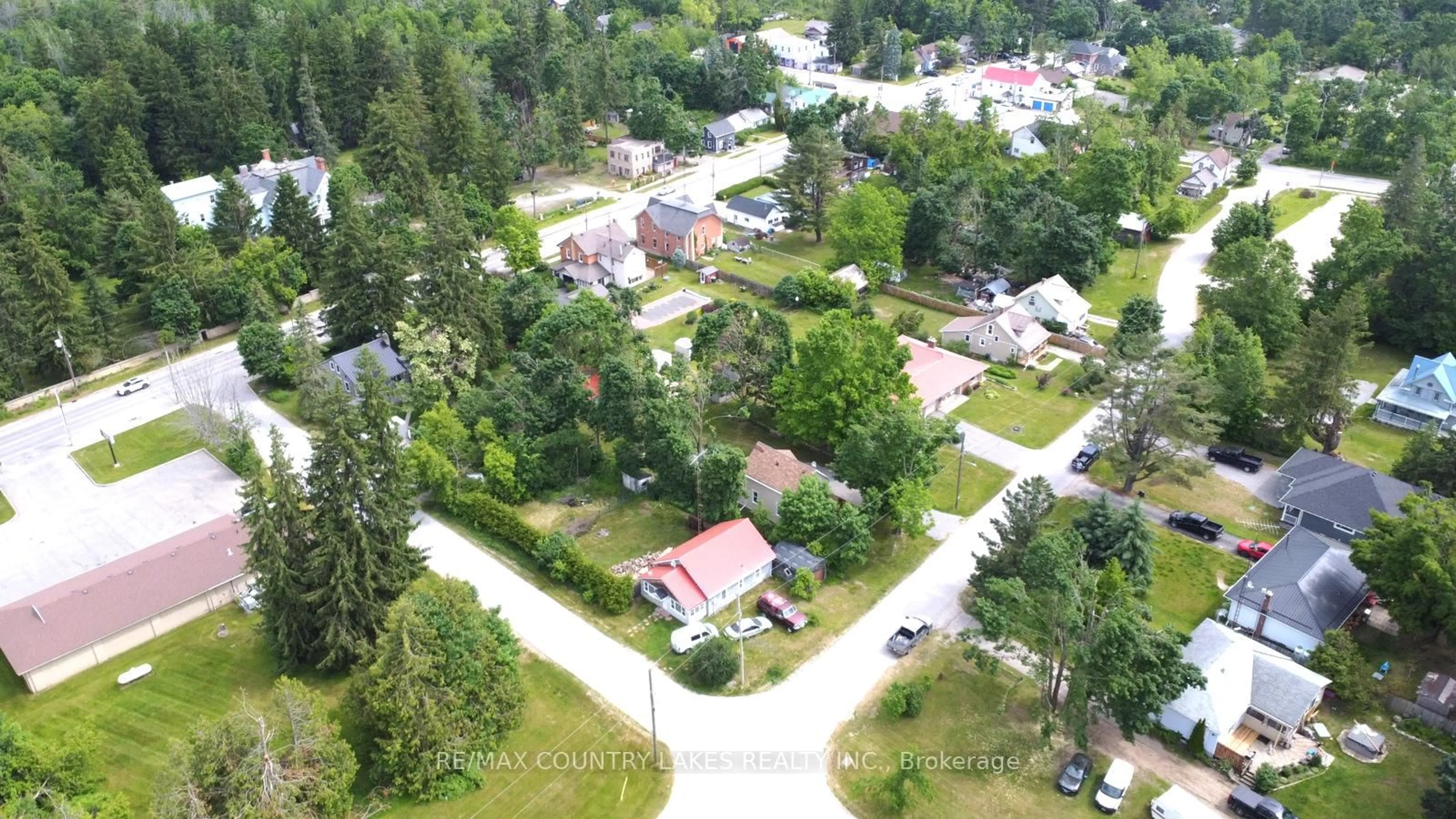 A pic from outside/outdoor area/front of a property/back of a property/a pic from drone, street for 18 John St, Kawartha Lakes Ontario K0M 2B0