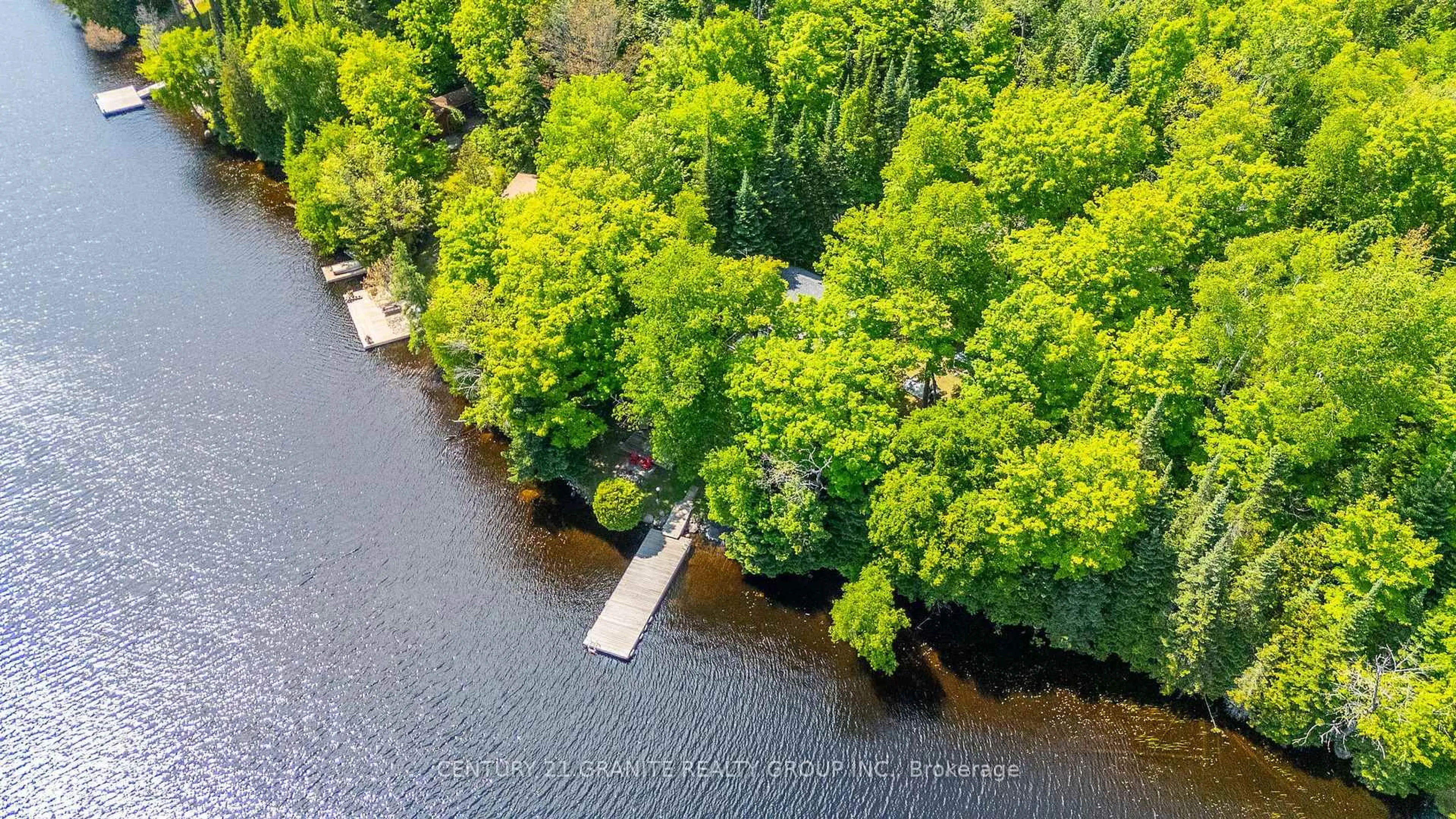A pic from outside/outdoor area/front of a property/back of a property/a pic from drone, water/lake/river/ocean view for 509 Dog Bay Rd, Maynooth Ontario K0L 2S0
